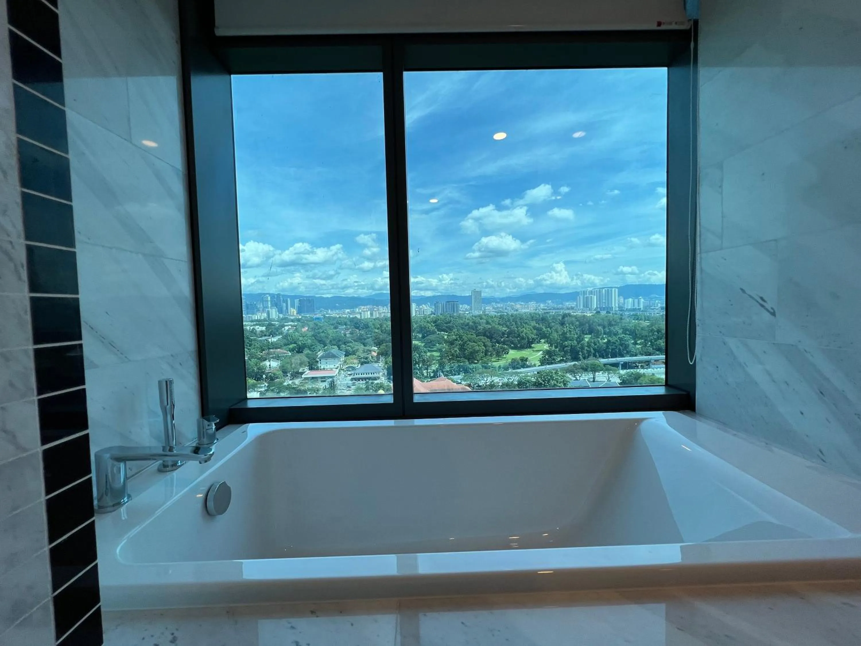 Bathroom in Eaton Residences KLCC by WSD
