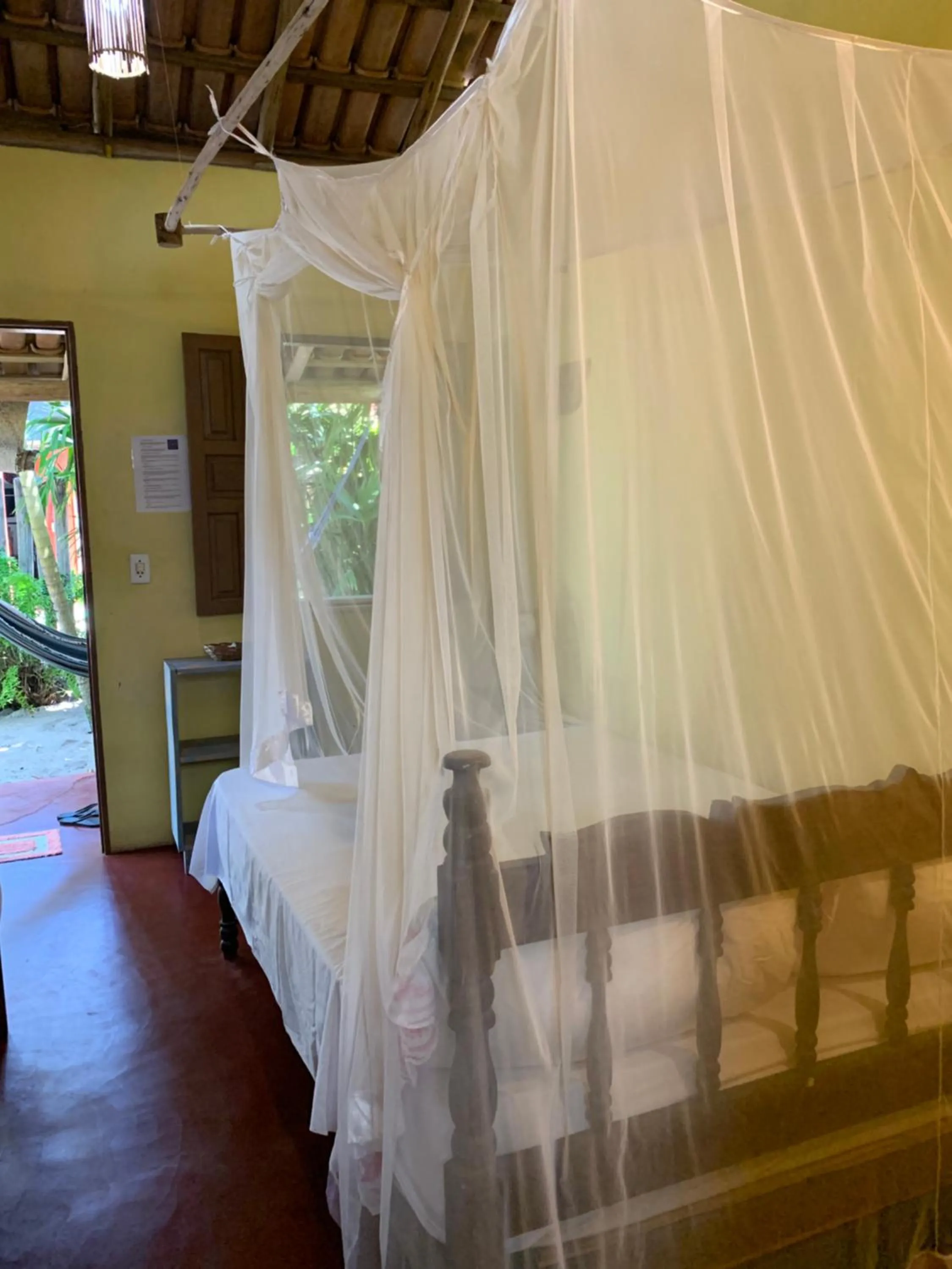 Bed in Pousada Deus mim Deu