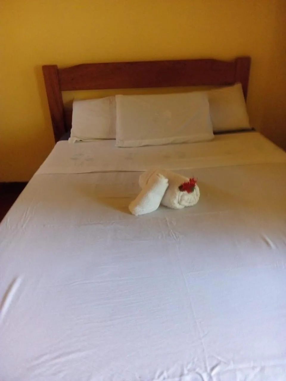 Bed in Pousada Deus mim Deu