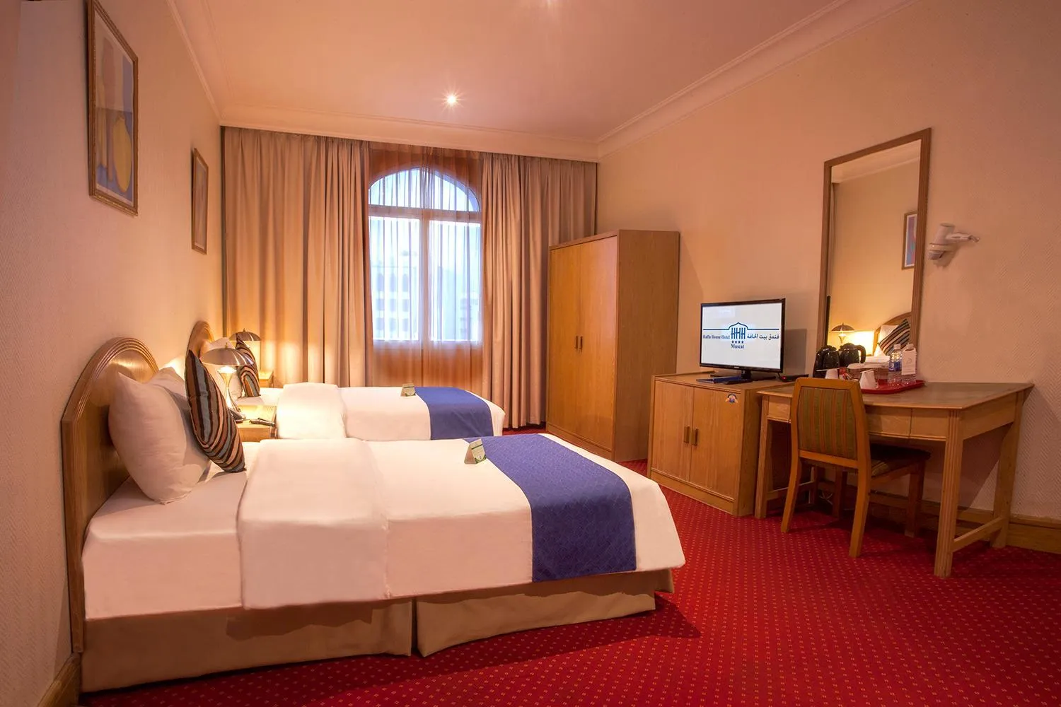 Bed in HAFFA HOUSE HOTEL