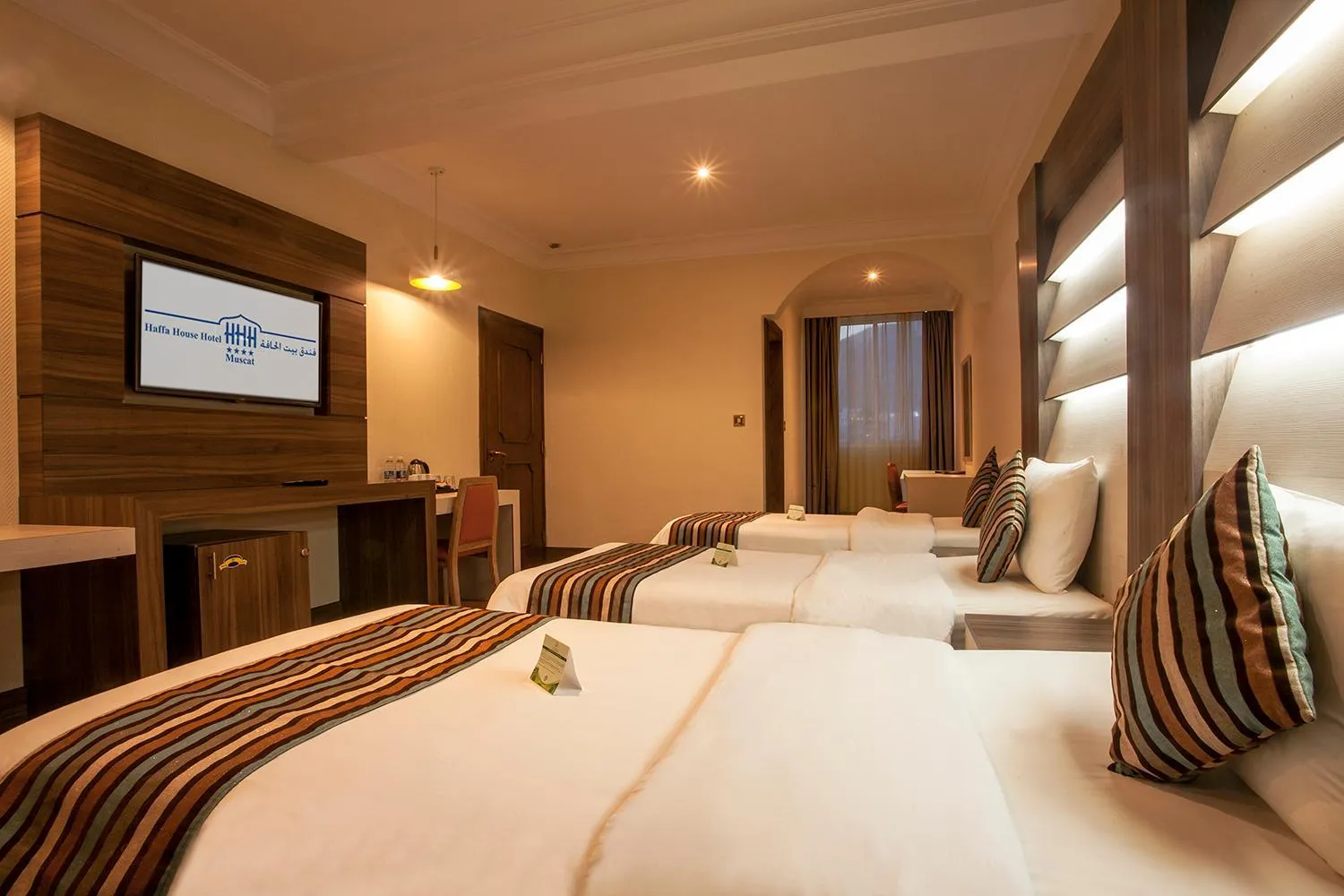 Bed in HAFFA HOUSE HOTEL