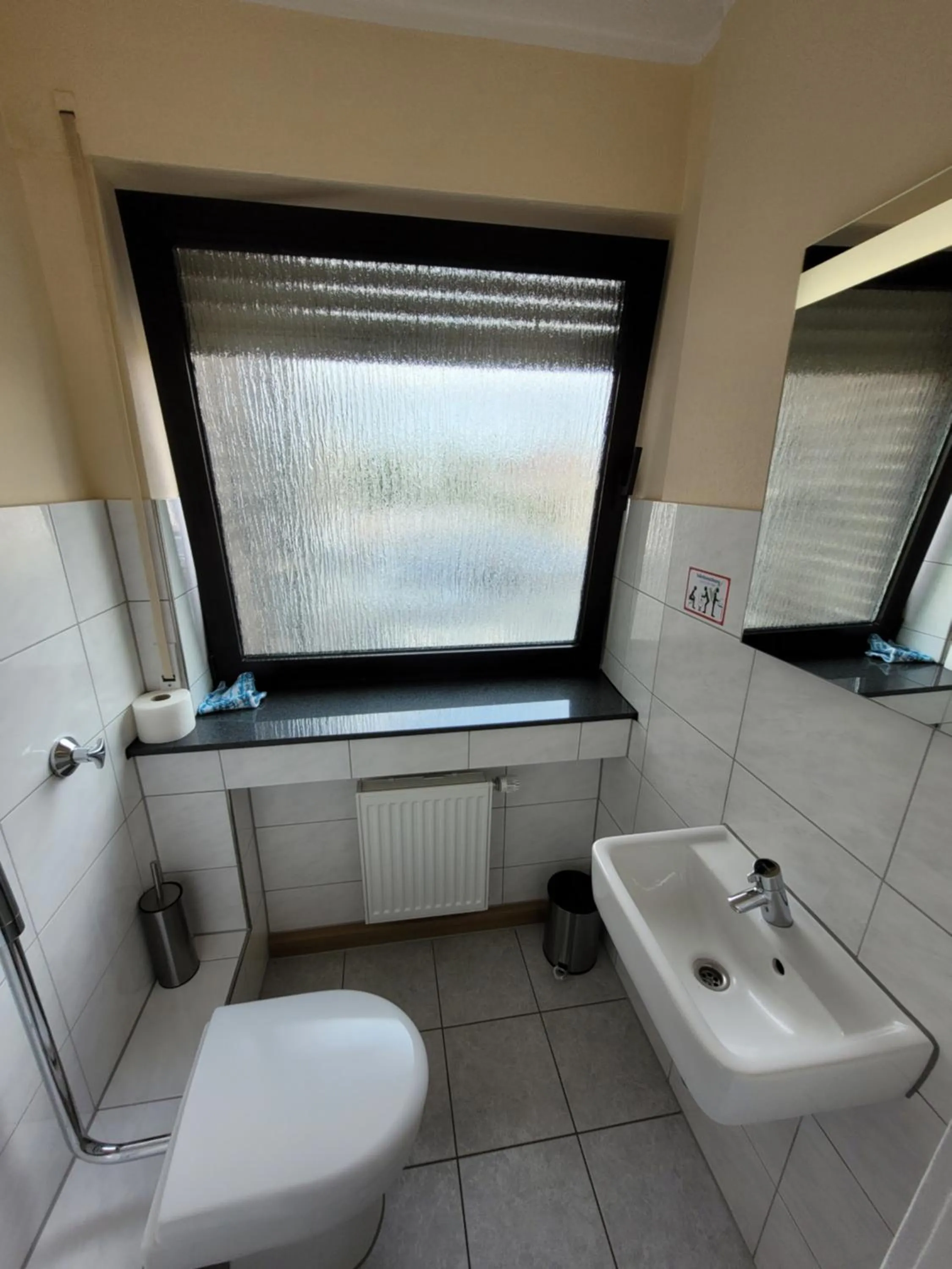 Toilet in Guesthouse WI rooms