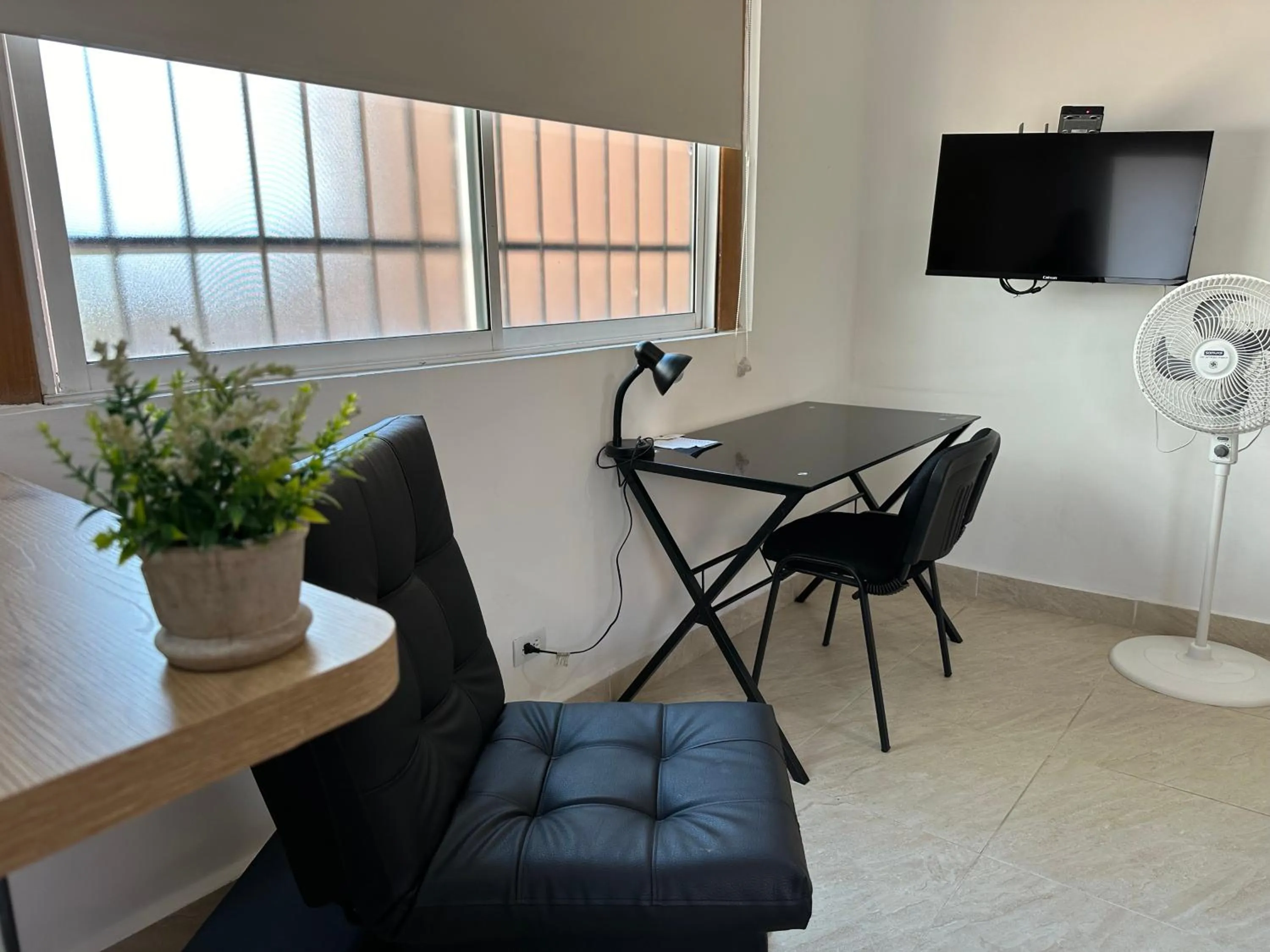 TV and multimedia in Laureles Guest House LGH Hotel