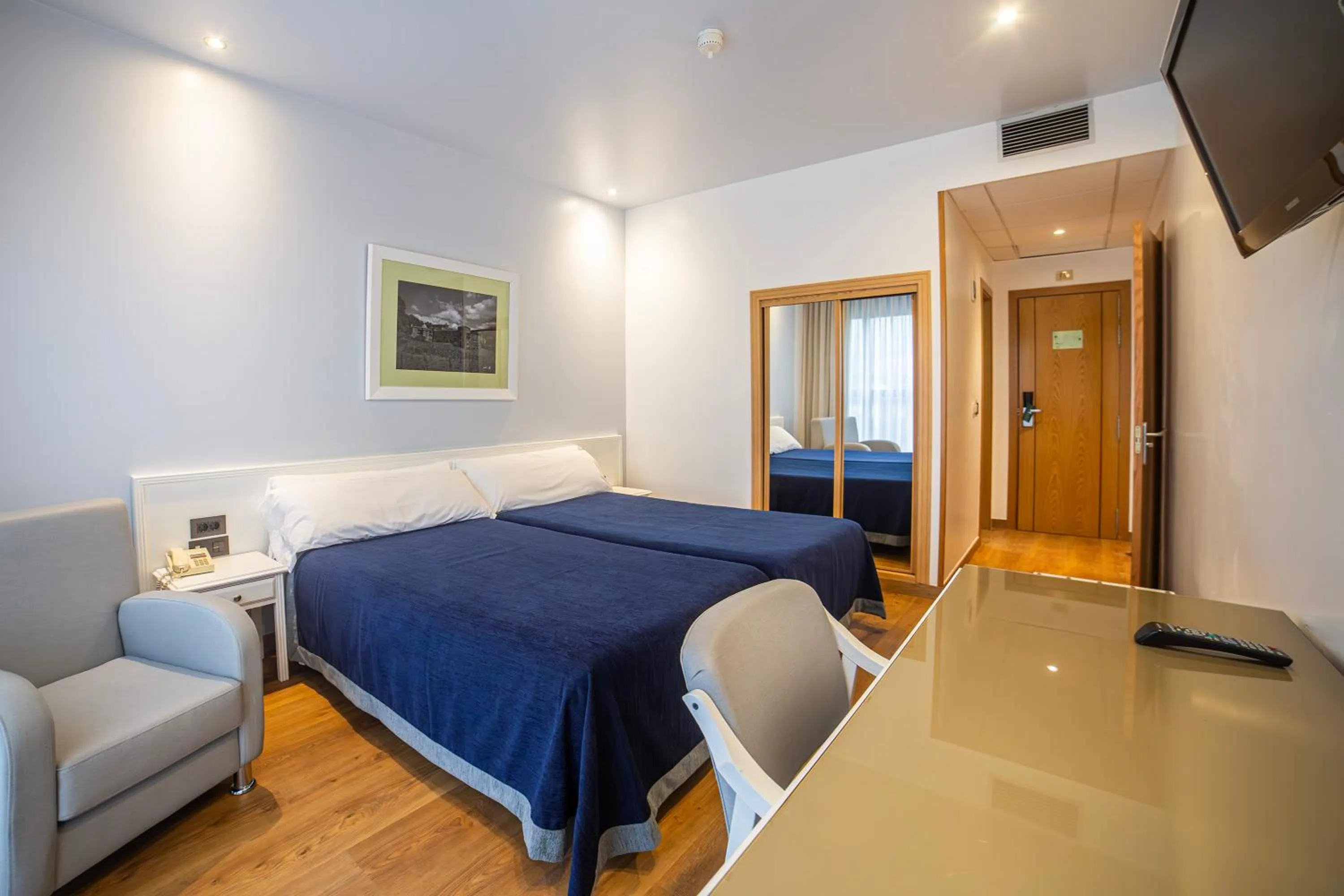 Bedroom, Bed in Hotel Auditorio Santiago & Spa