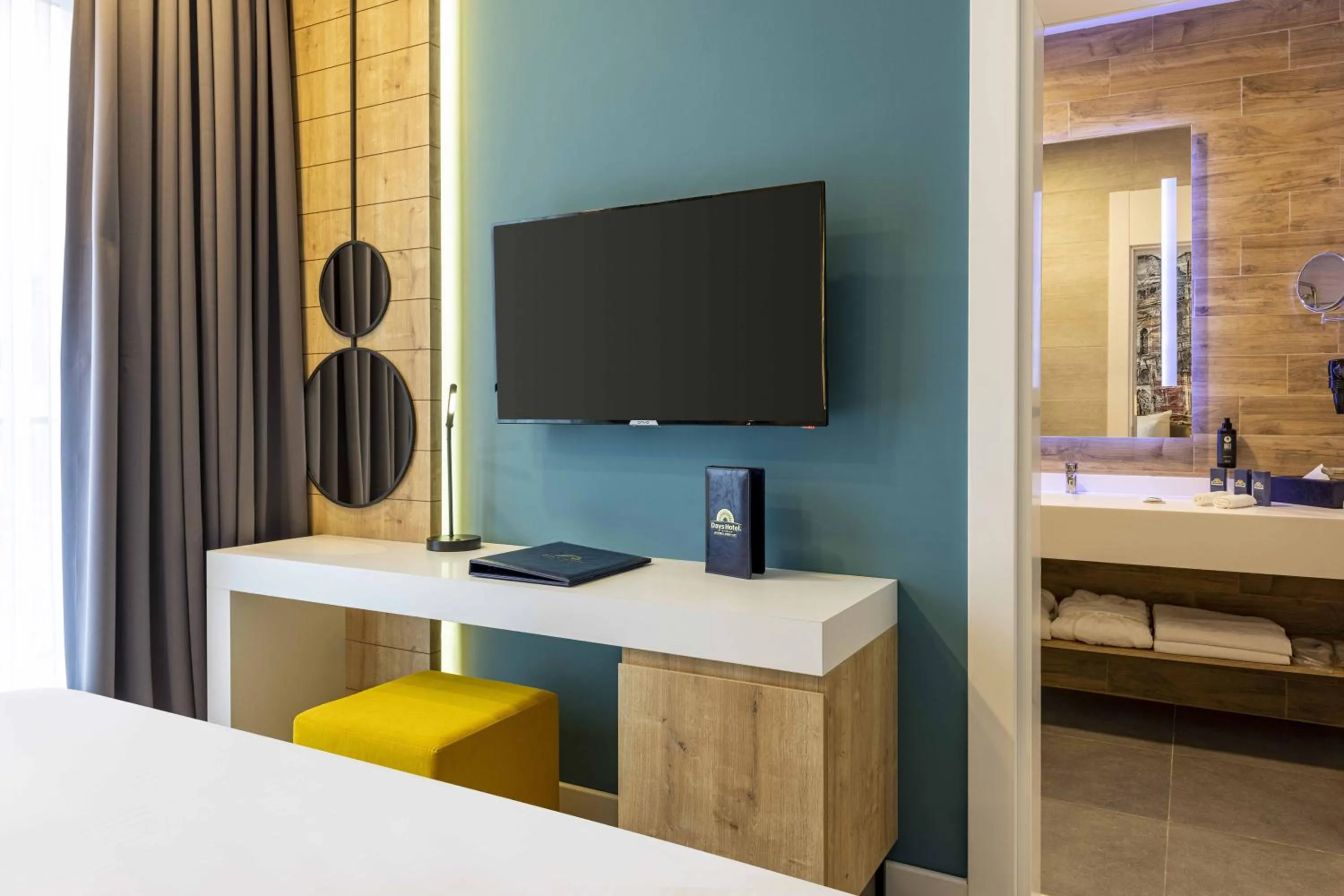 Communal lounge/ TV room, Bed in Days Inn & Suites by Wyndham Istanbul Esenyurt