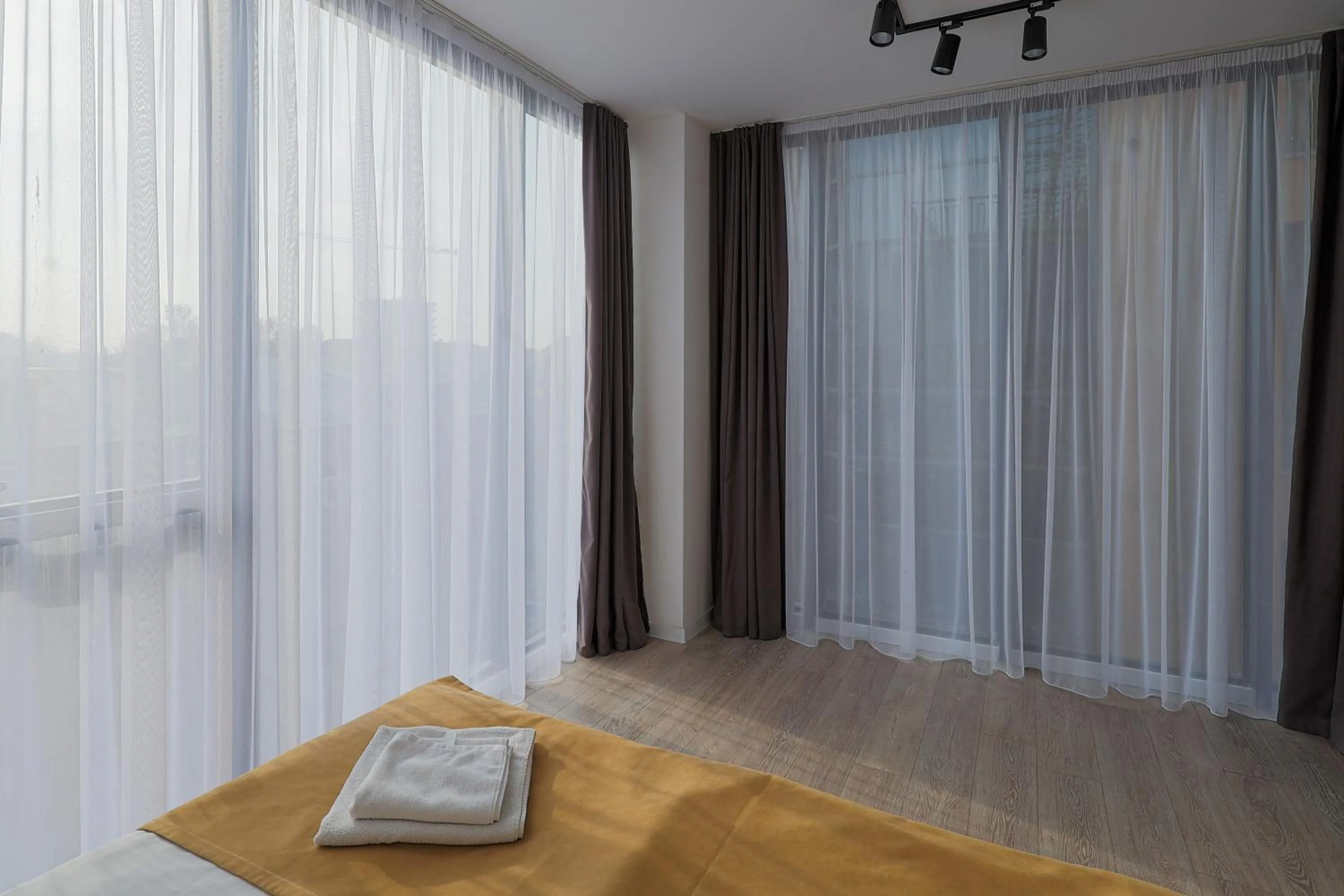 Bedroom, Bed in Welcome Republic Square Apartments