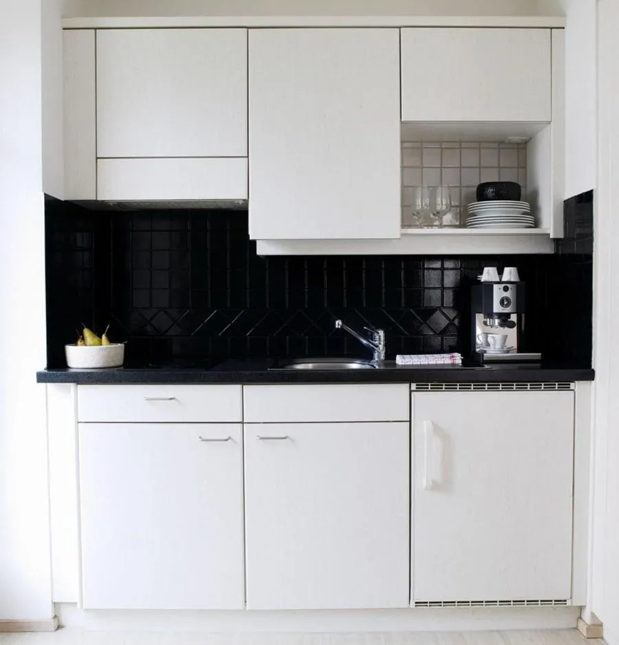 Kitchen or kitchenette in VISIONAPARTMENTS Cramerstrasse 8-12 - contactless check-in