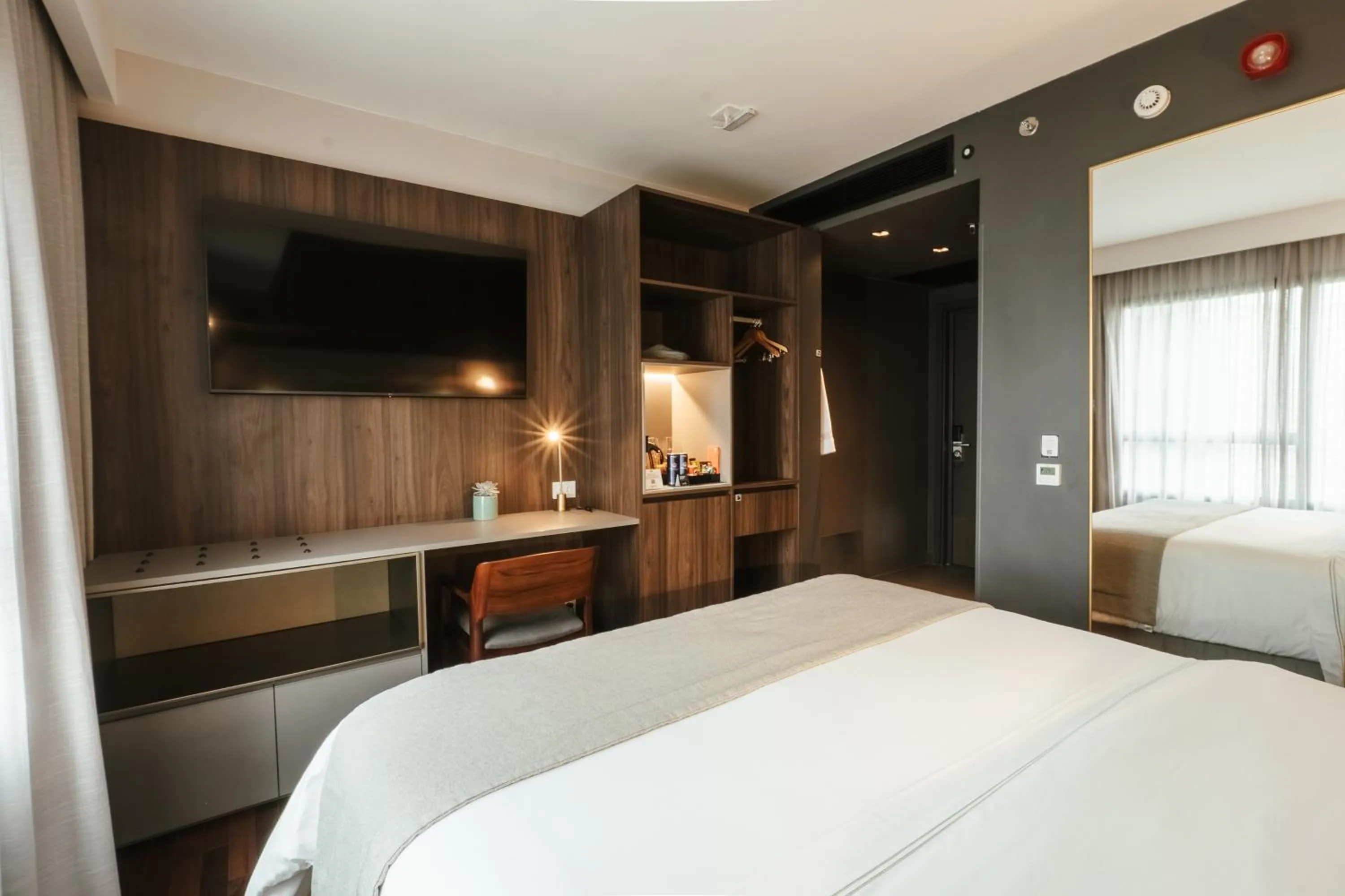 Bed in Qoya São Paulo Paulista, Curio Collection by Hilton