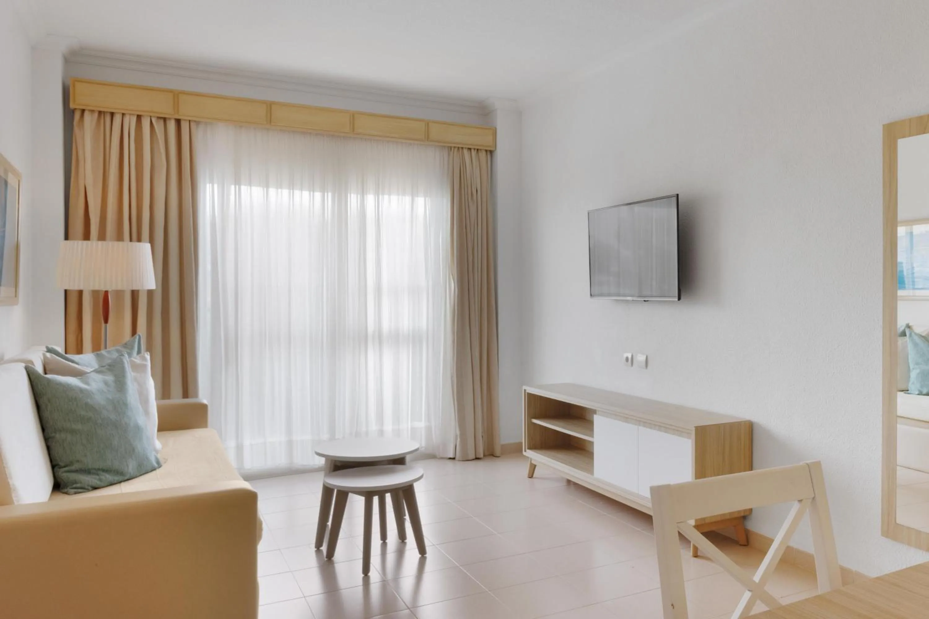 Communal lounge/ TV room in VIVA Blue & Spa