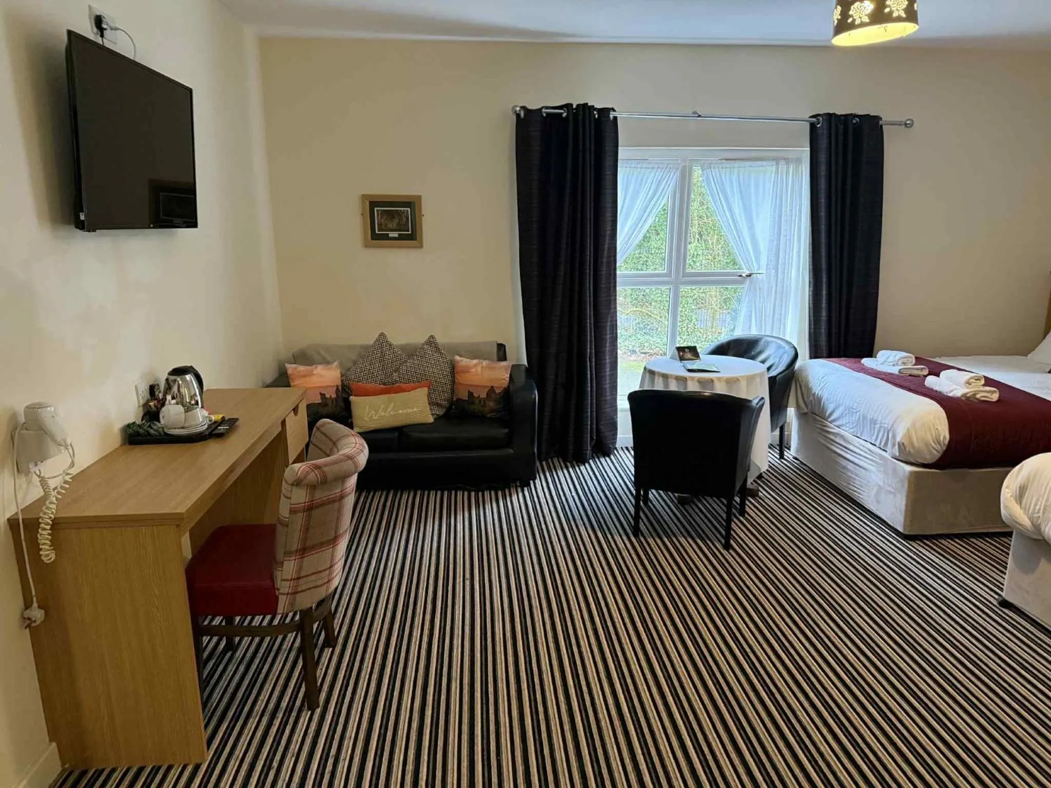 Bed in The Hedges Hotel