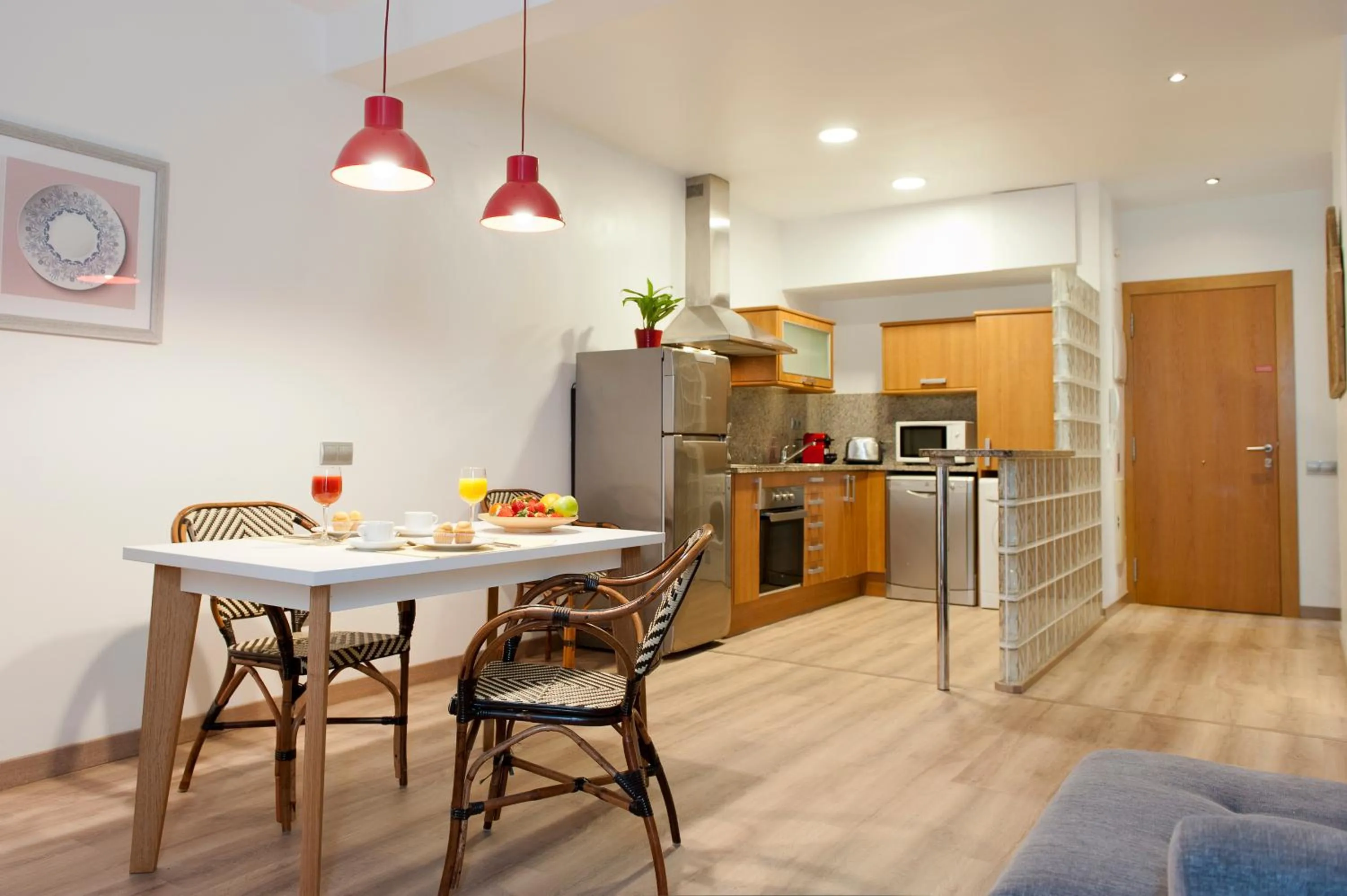 Kitchen or kitchenette in MH Apartments S. Familia