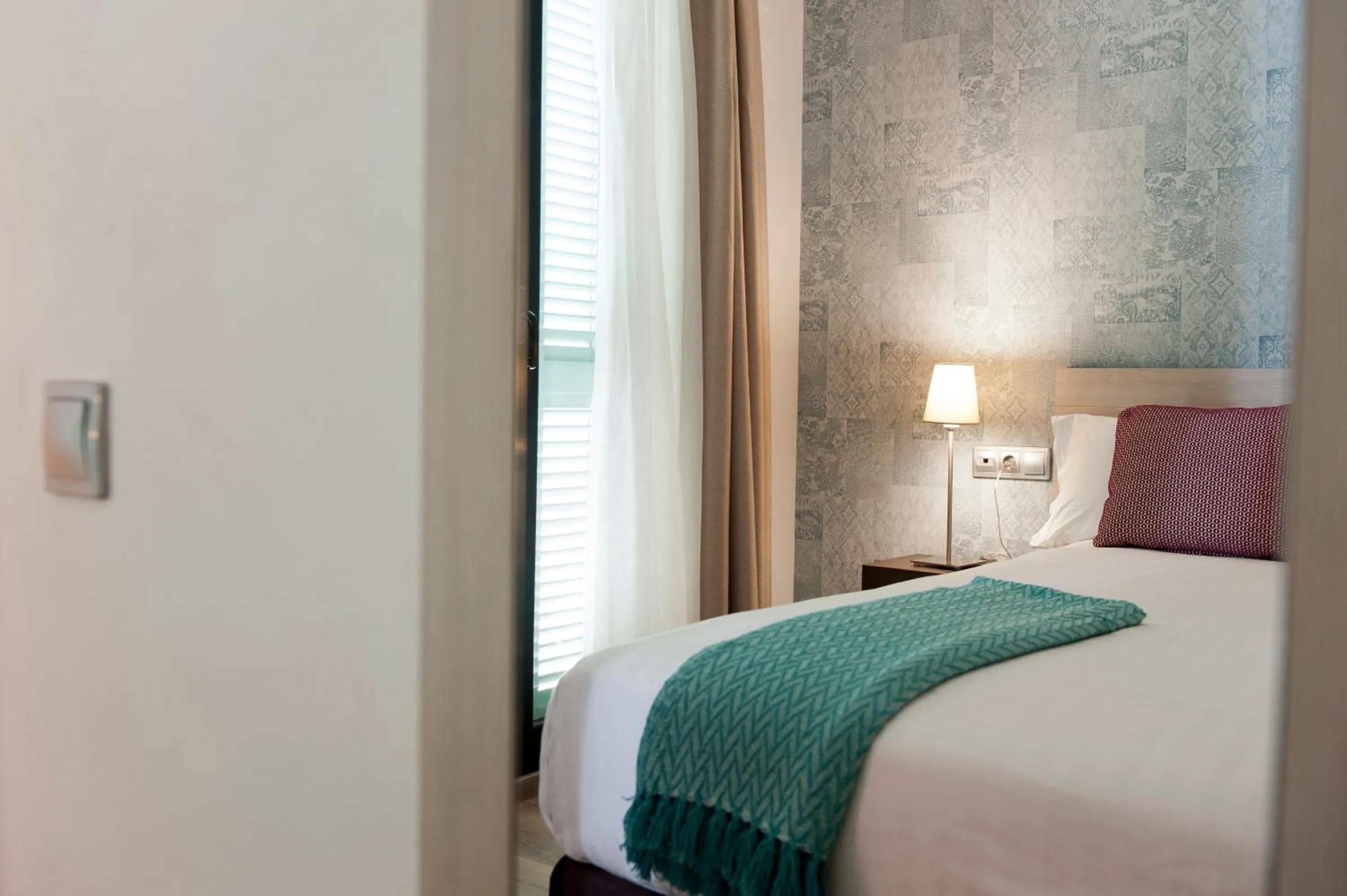 Bedroom, Bed in MH Apartments S. Familia