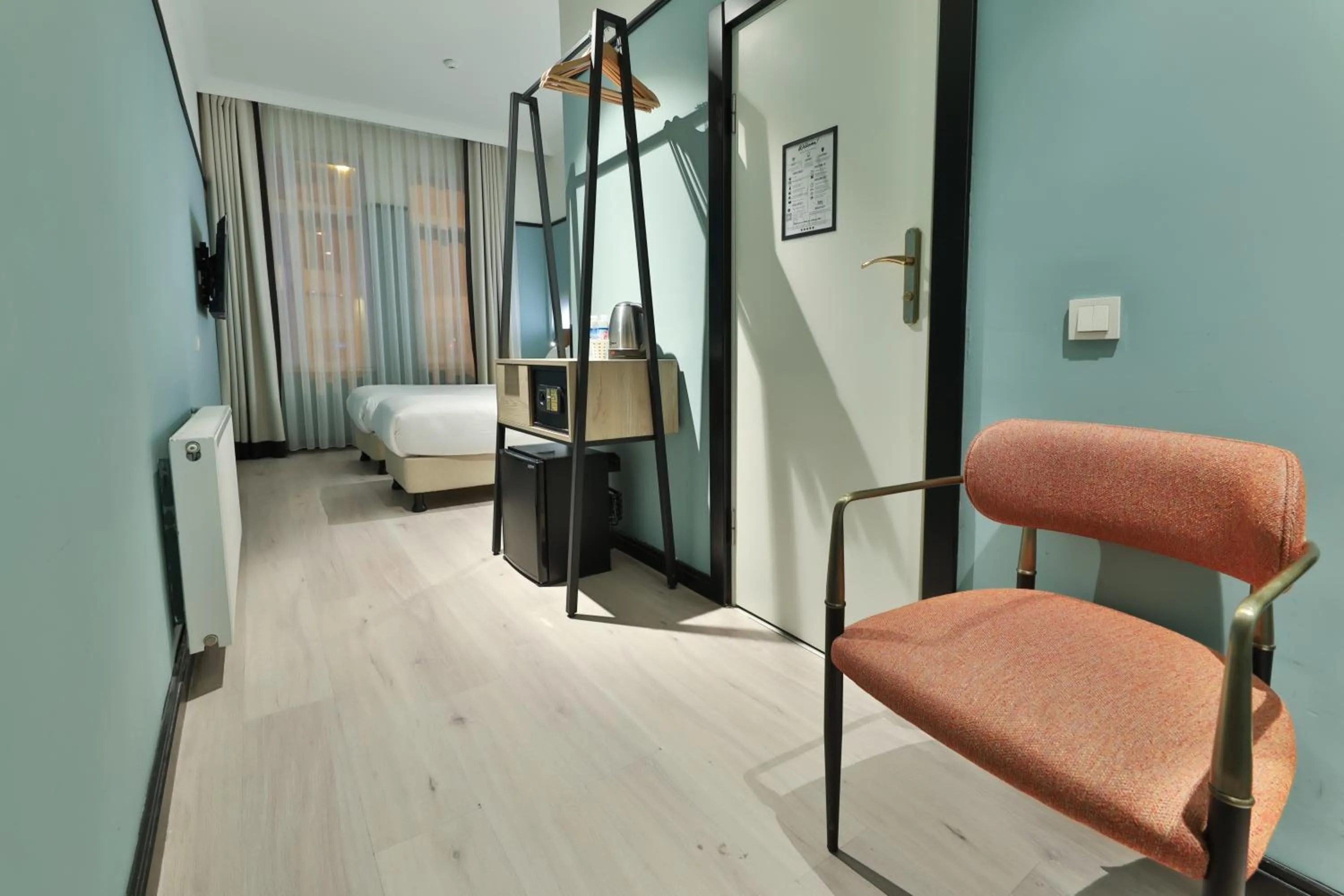 Seating area, Bed in EA Exclusive Hotel