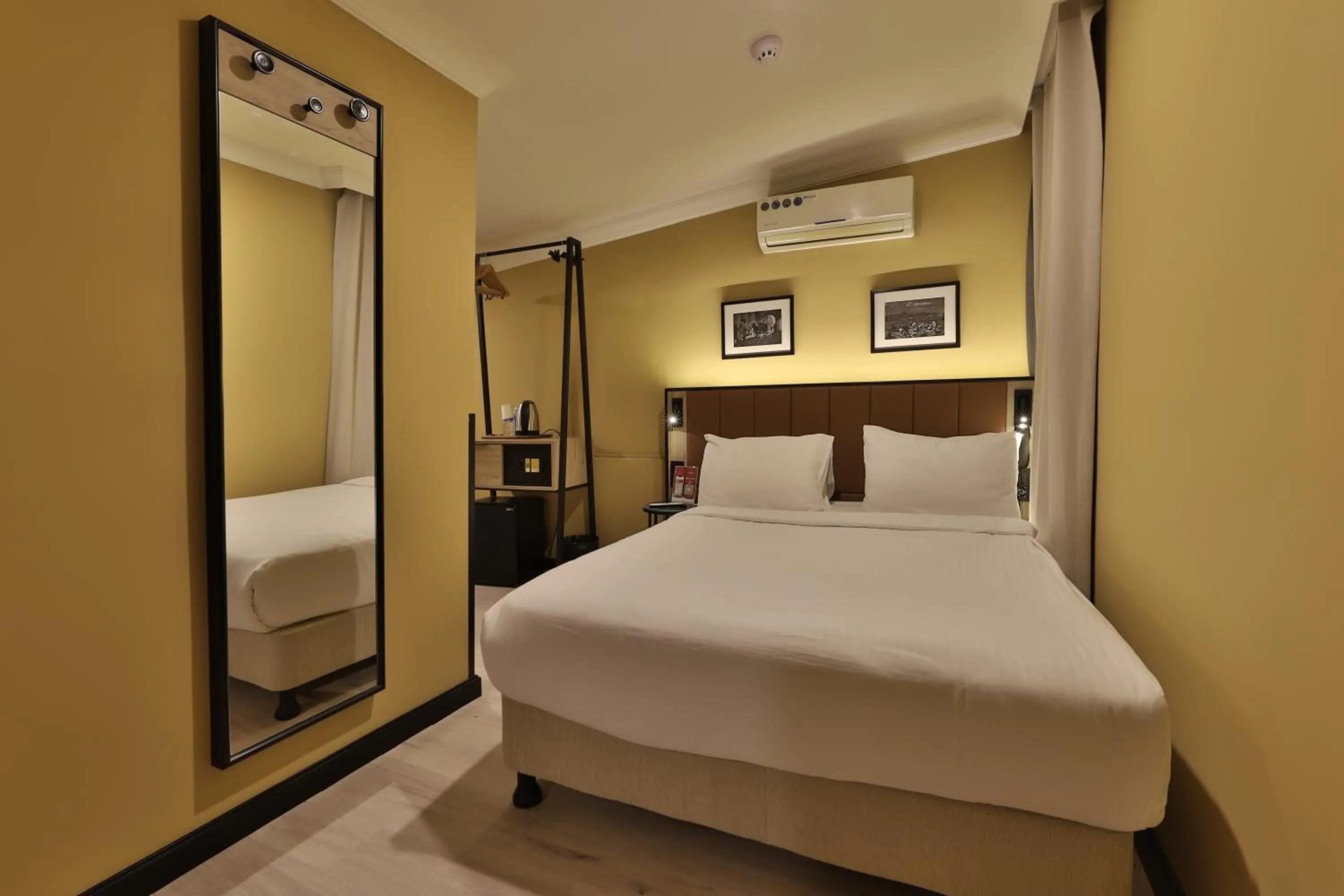 Bed in EA Exclusive Hotel