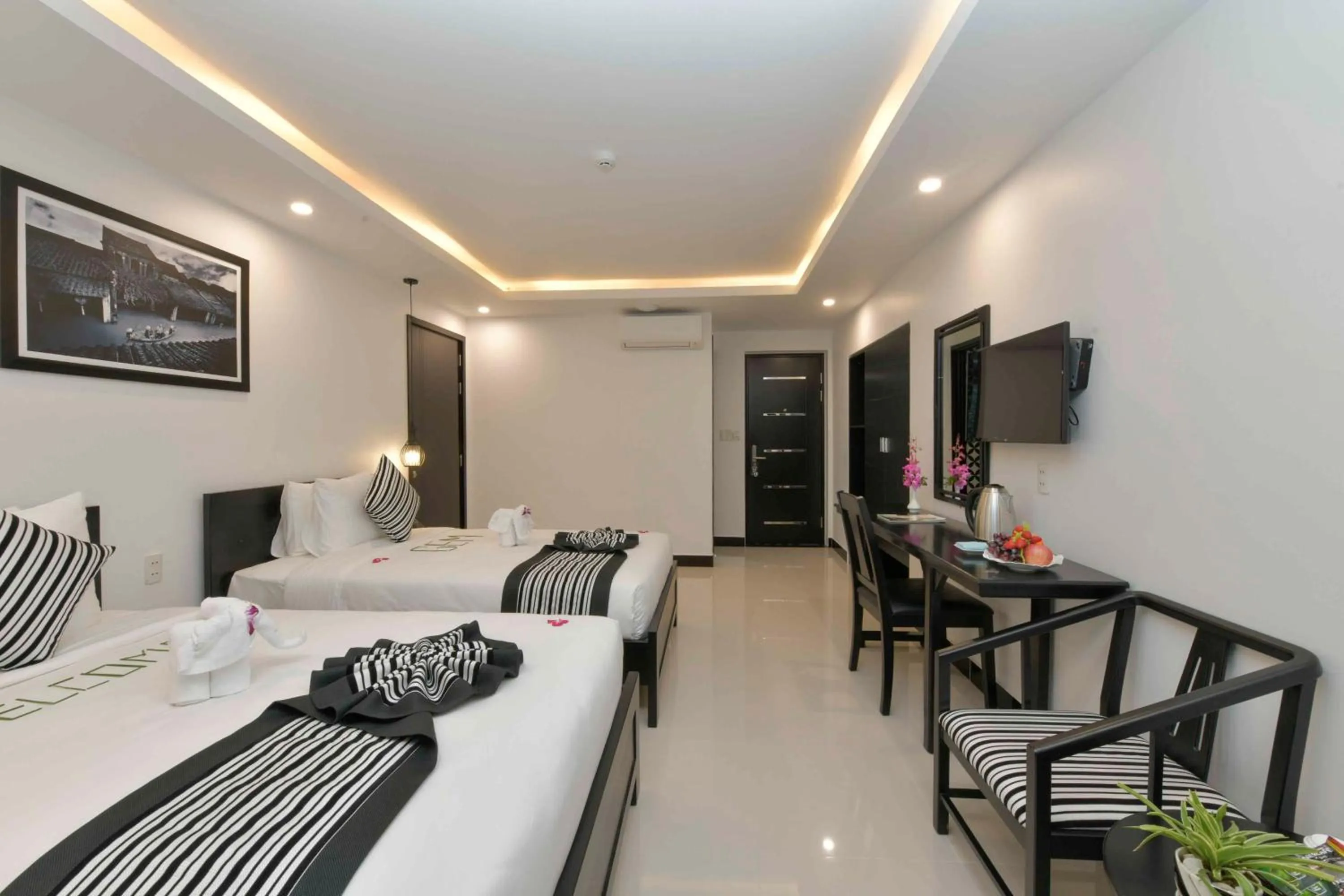 Bed in Gem Riverside Hotel Hoi An