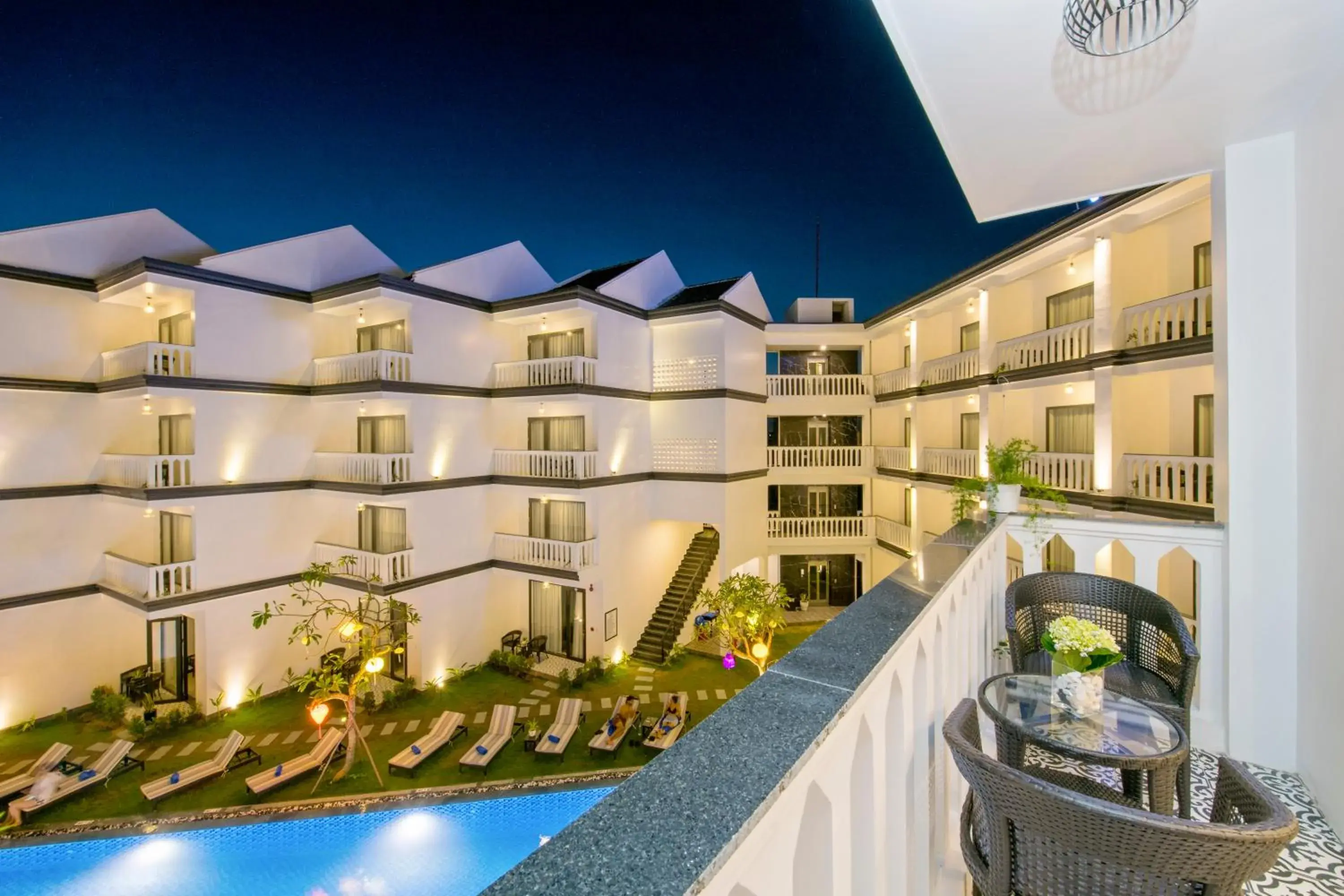 Triple Room with Pool View in Gem Riverside Hotel Hoi An Triple Room with Pool View in Gem Riverside Hotel Hoi An