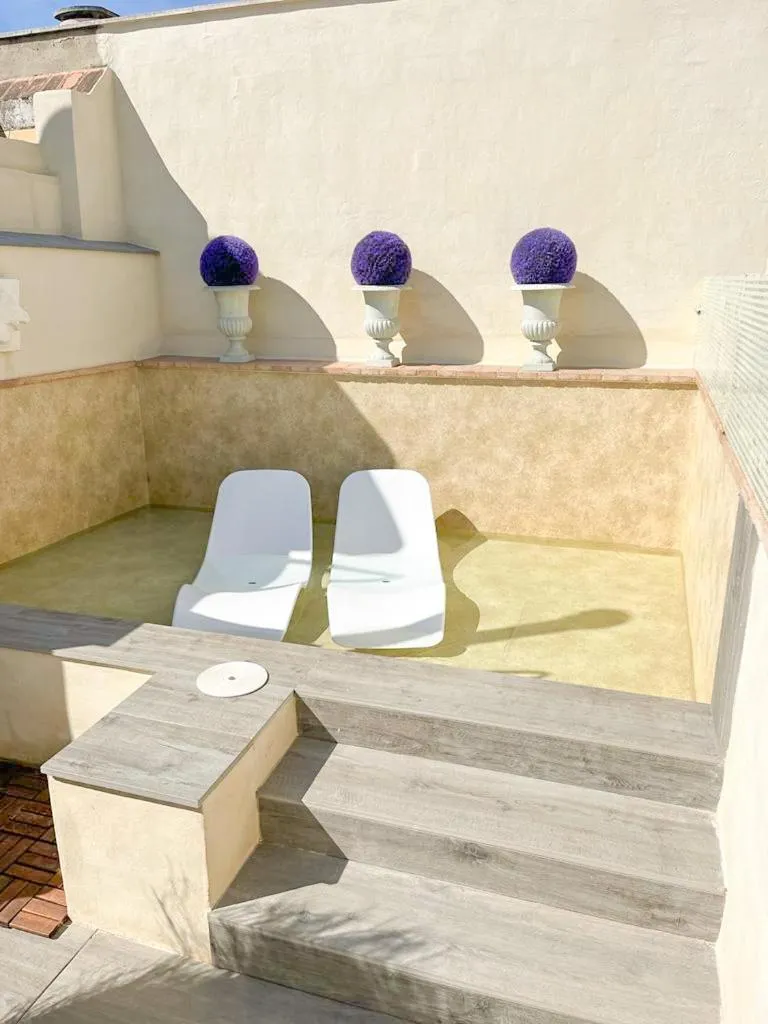 Swimming pool in Hostal Hom Museo