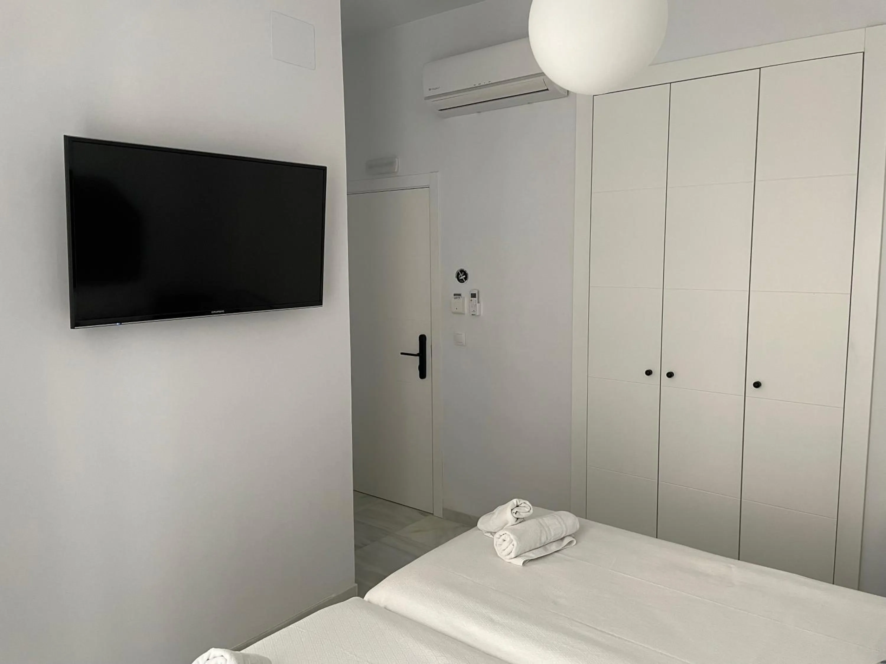 Bed in Hostal Hom Museo