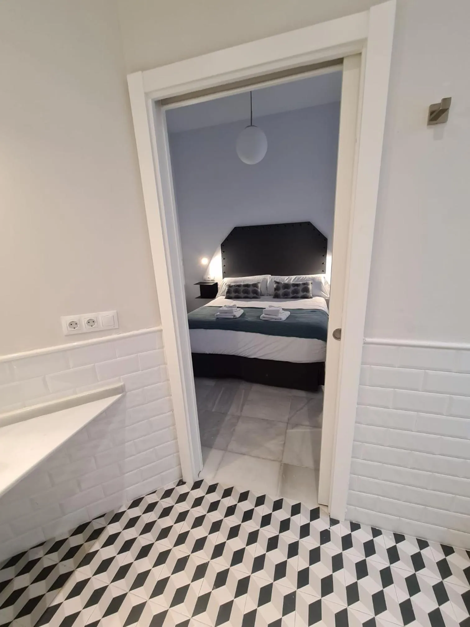 Bed in Hostal Hom Museo