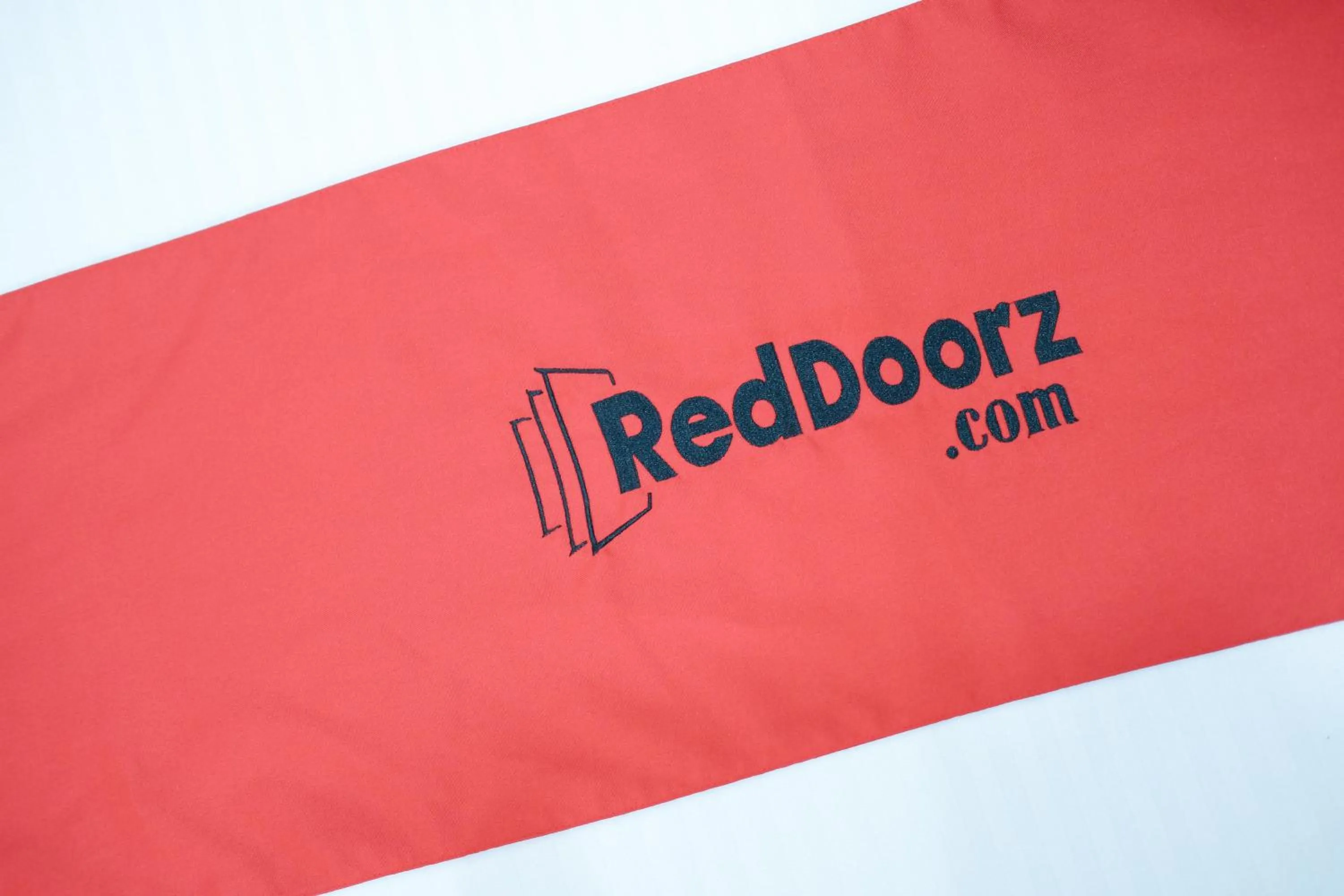 Property logo or sign in Sinoben Apartments by RedDoorz