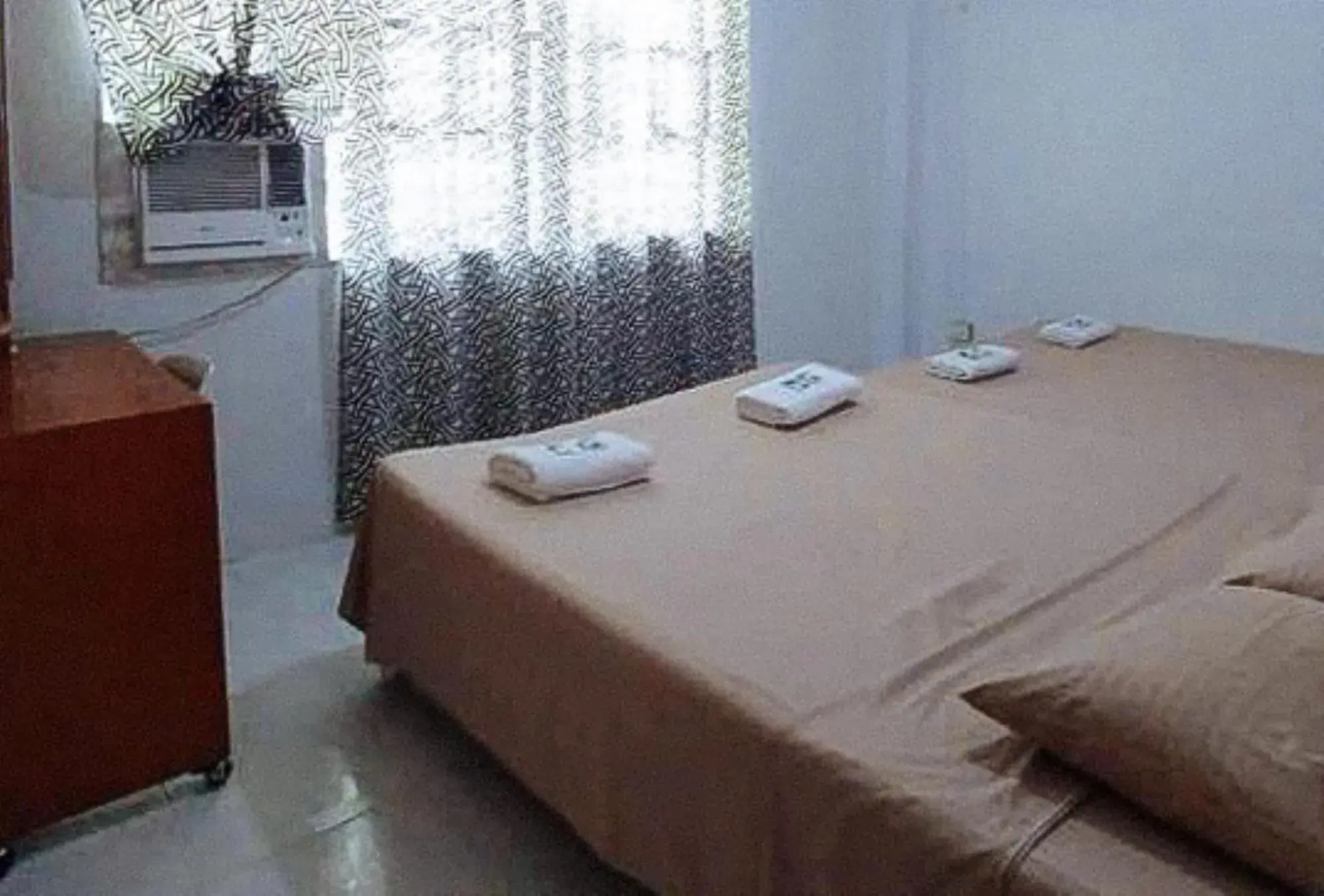 Family Room with Shared Bathroom in Sinoben Apartments by RedDoorz Family Room with Shared Bathroom in Sinoben Apartments by RedDoorz