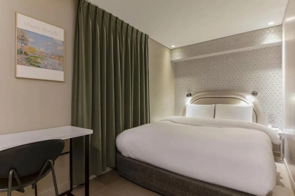 Bed in Sillim Dominique Hotel