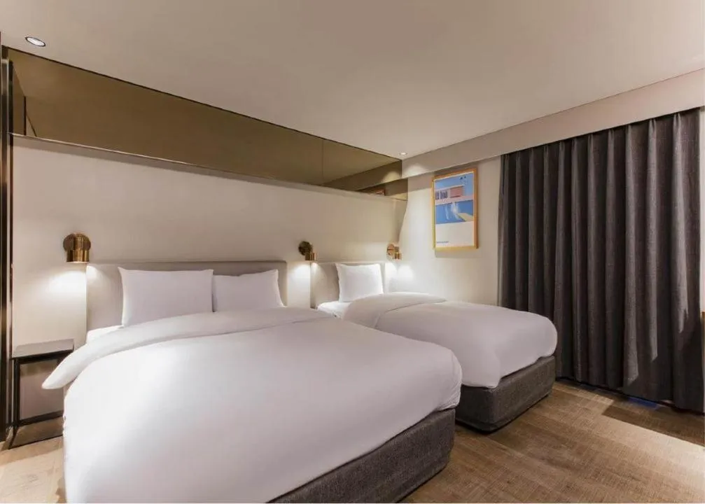 Bed in Sillim Dominique Hotel