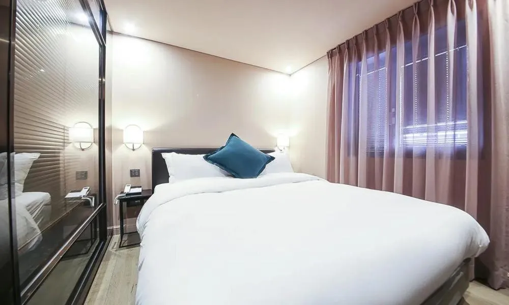 Bed in Sillim Dominique Hotel