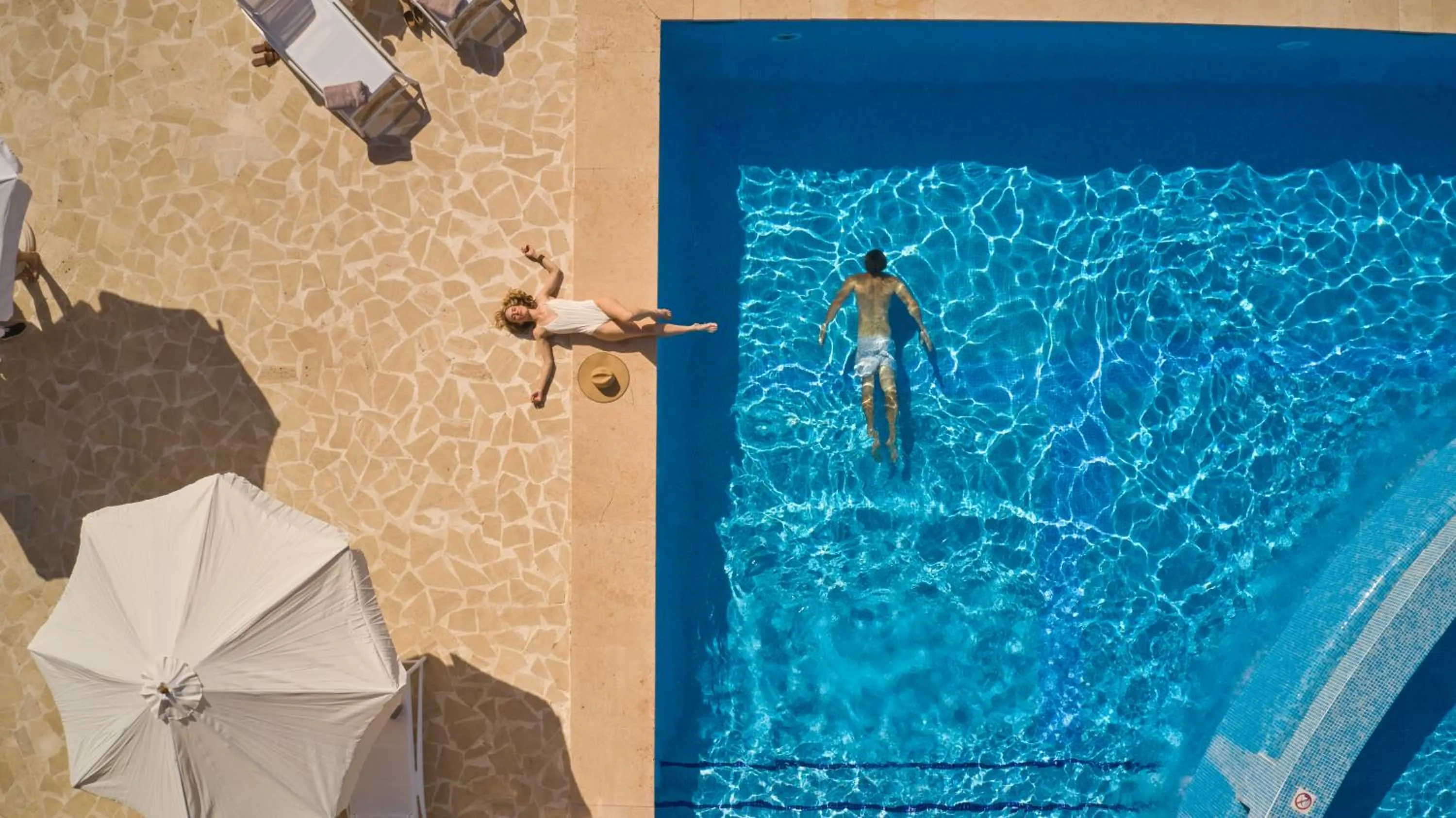 Swimming pool in Pula Suites Boutique Resort