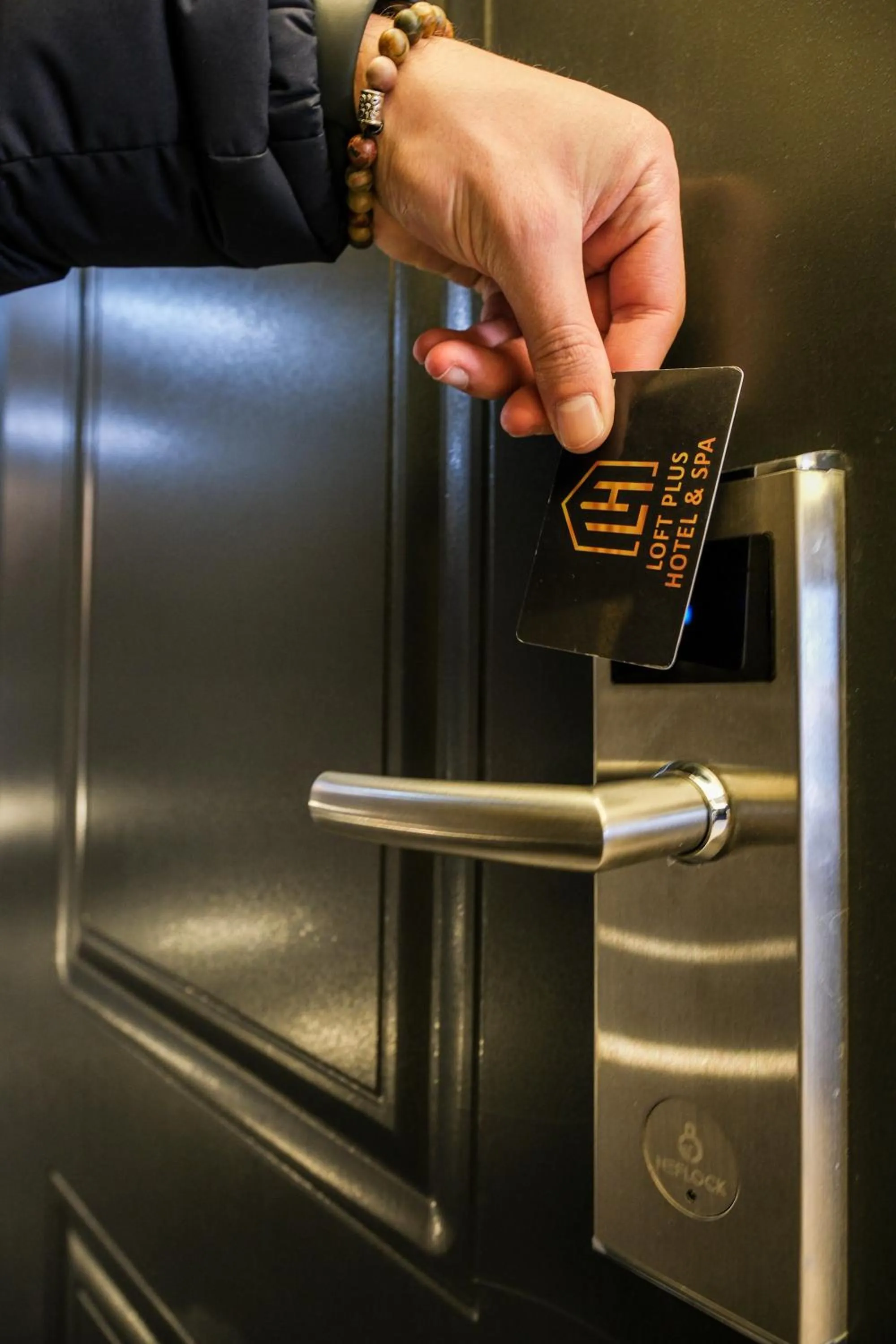 Property logo or sign in Loft Plus Hotel's