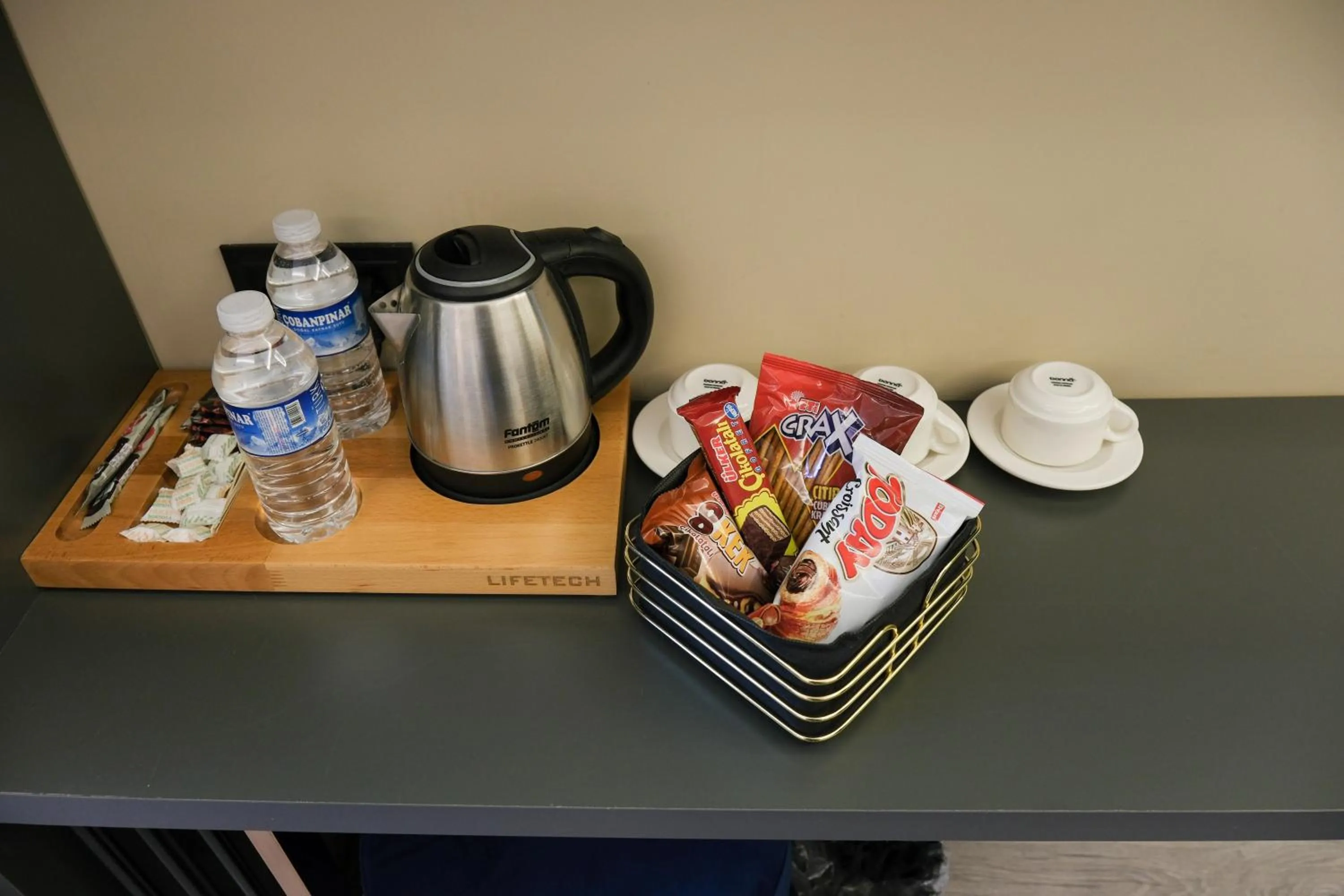 Communal lounge/ TV room in Loft Plus Hotel's