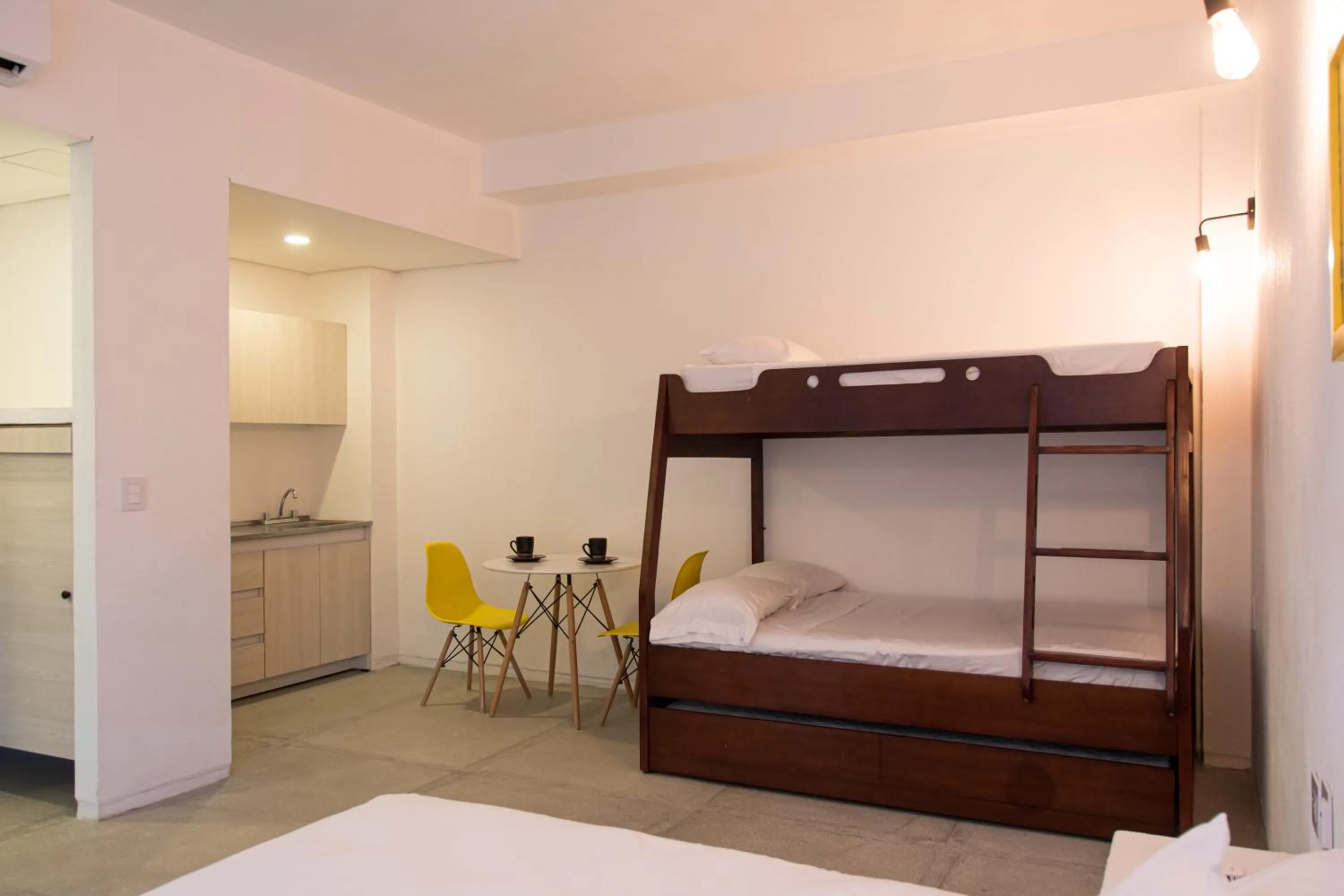 Bed in OASIS TROPICAL HOTEL