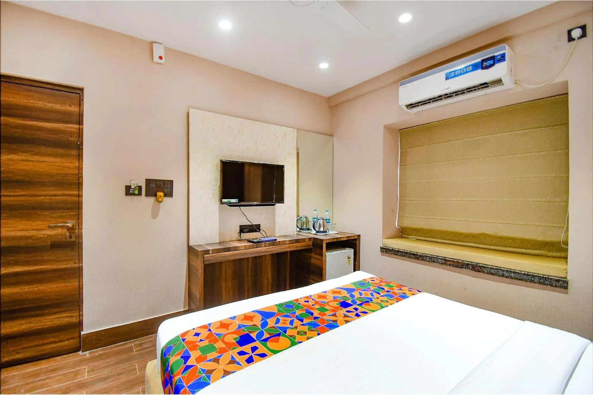 Bed in FabHotel Prime Jalsa - Nr Axis Mall