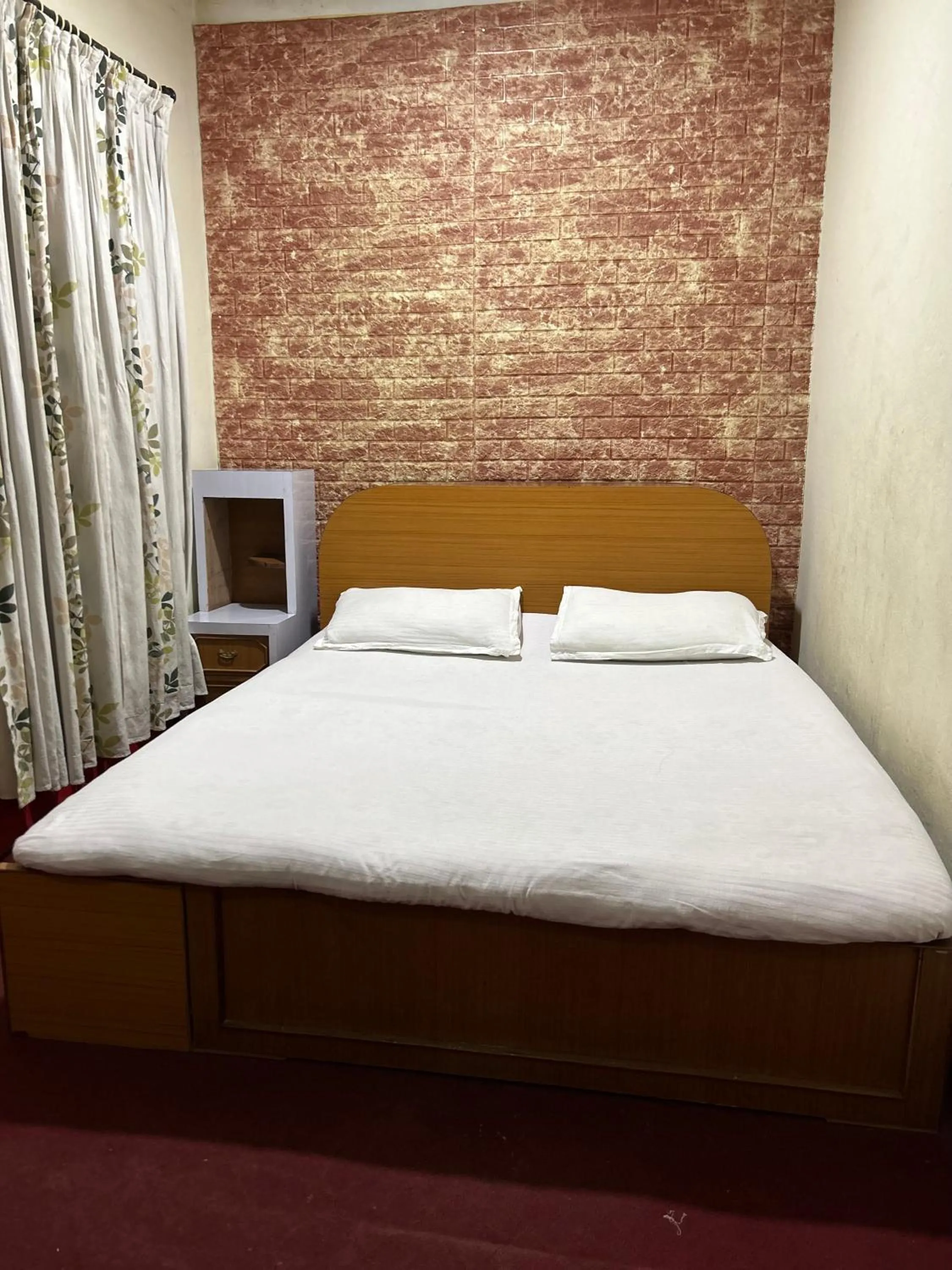 Bed in Sudha’s Garden Home