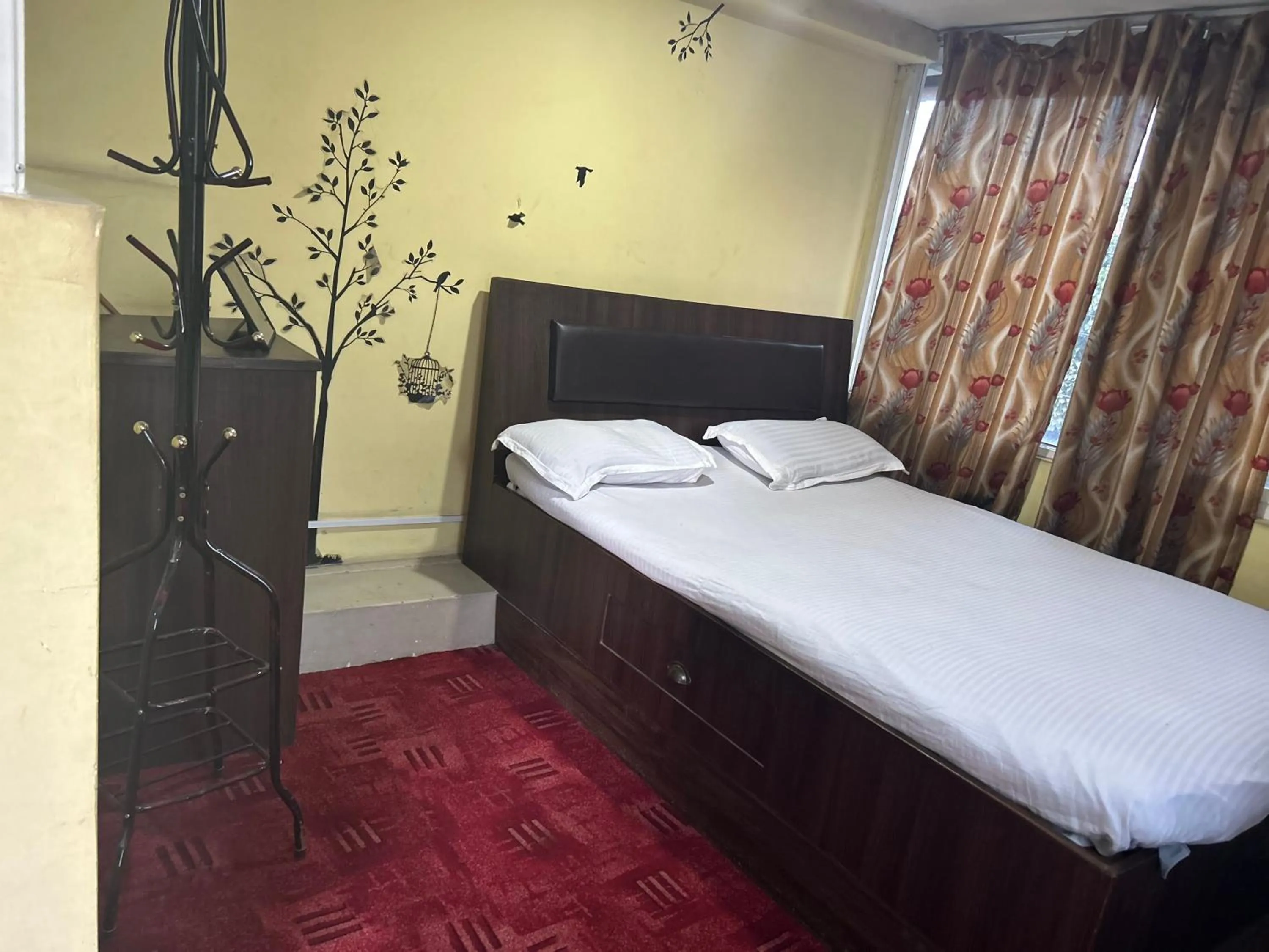 Bed in Sudha’s Garden Home