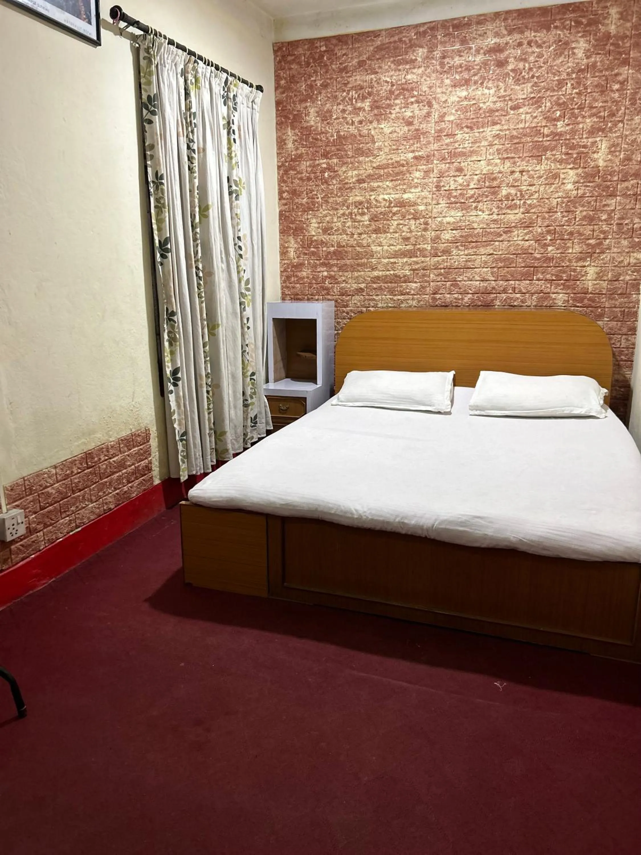 Bed in Sudha’s Garden Home