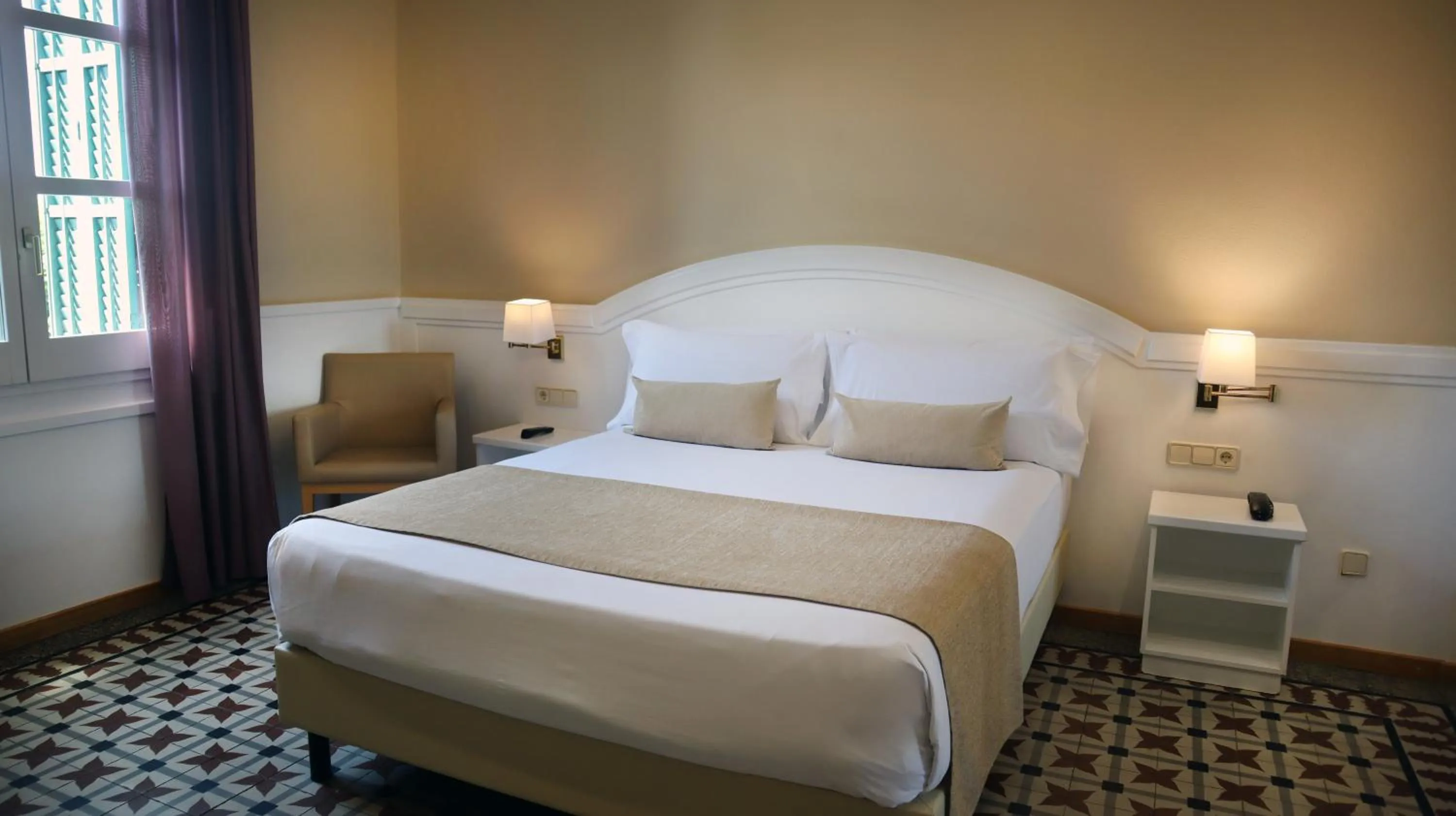 Bed in 1881 Hotel Balneario Vichy Catalan