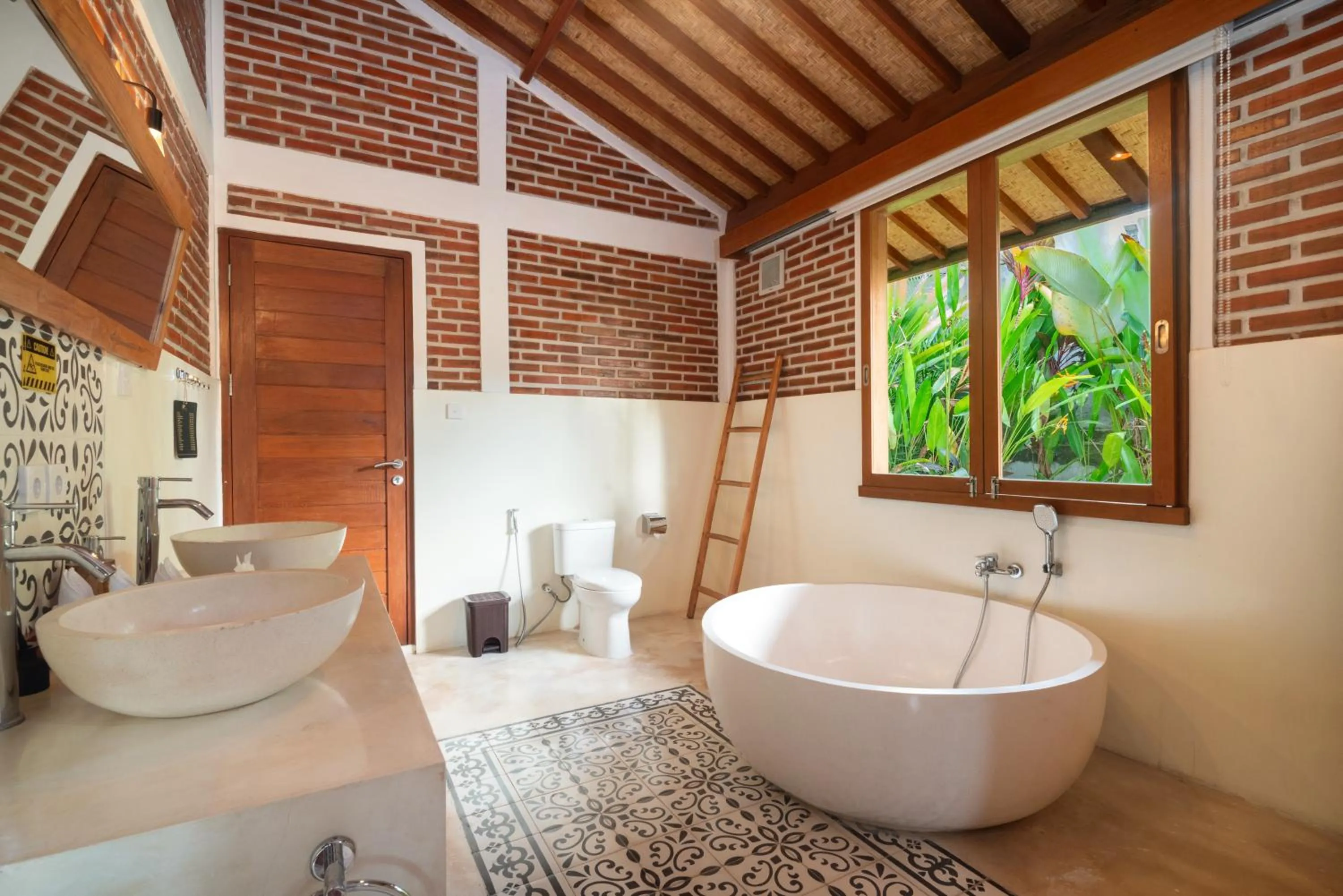 Bathroom in Kampung Uma Dawa Villas and Spa