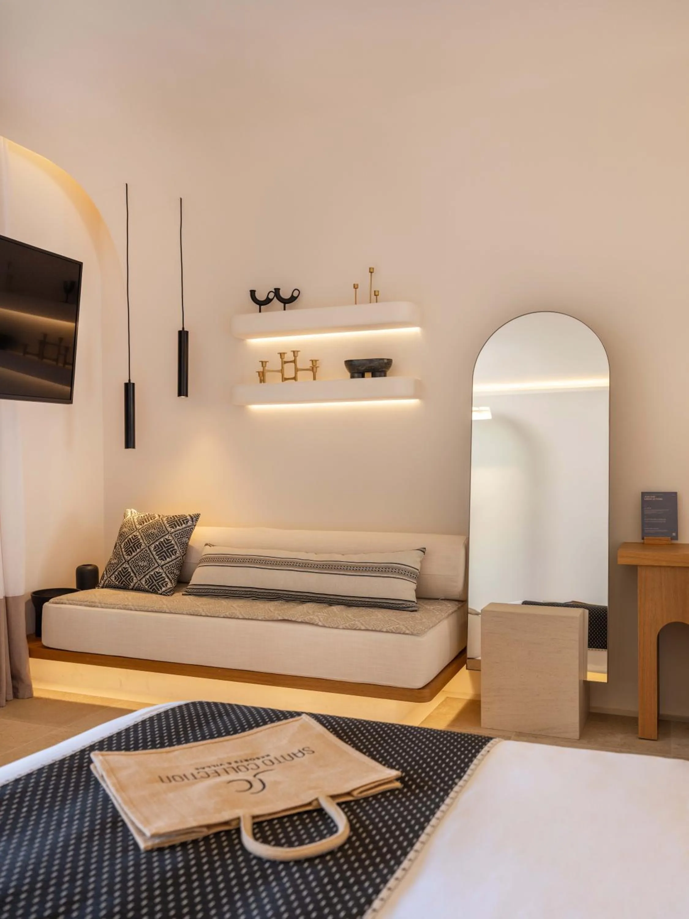Seating area, Bed in Santo Mine Oia Suites