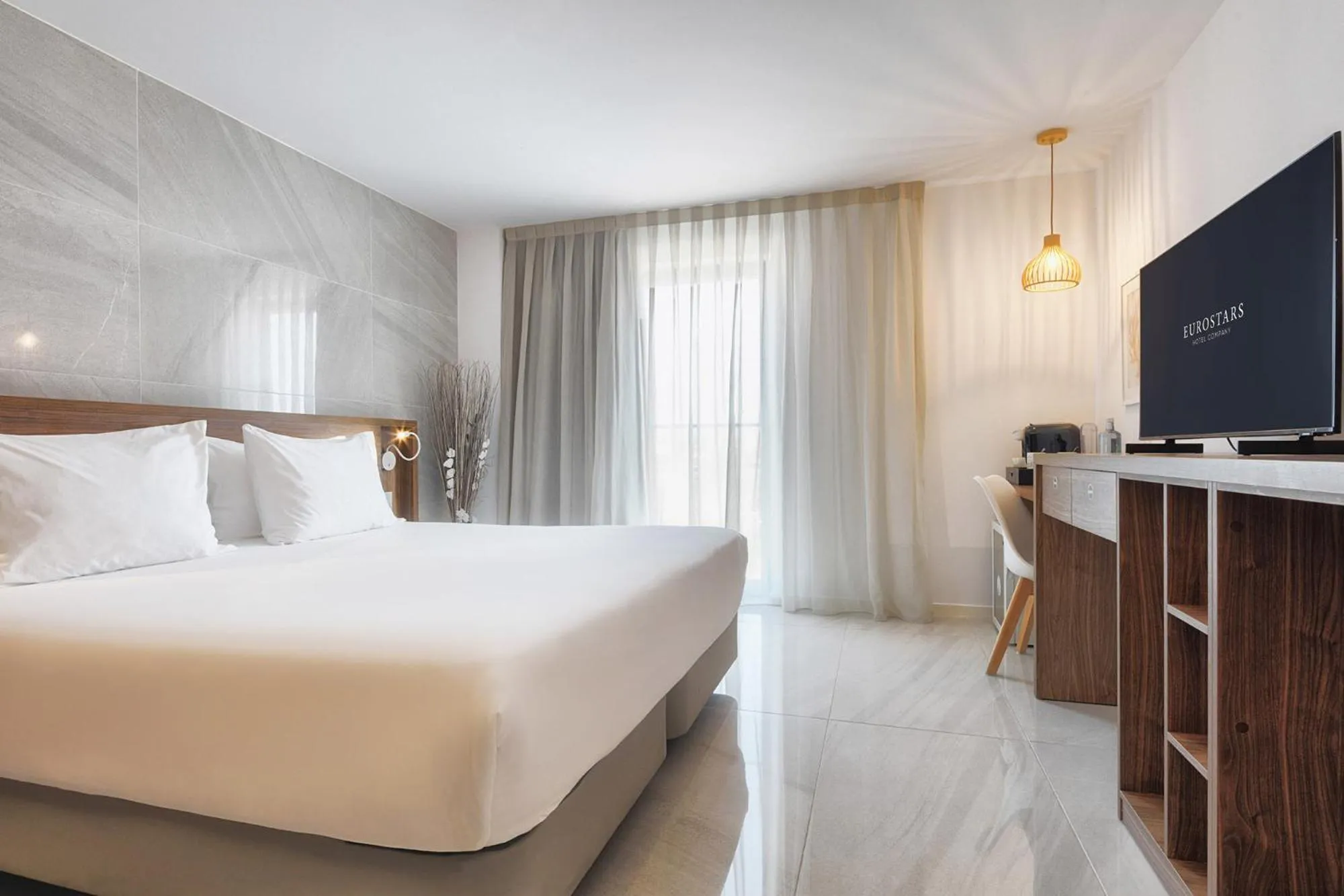 Bed in Eurostars Puerto de Ibiza