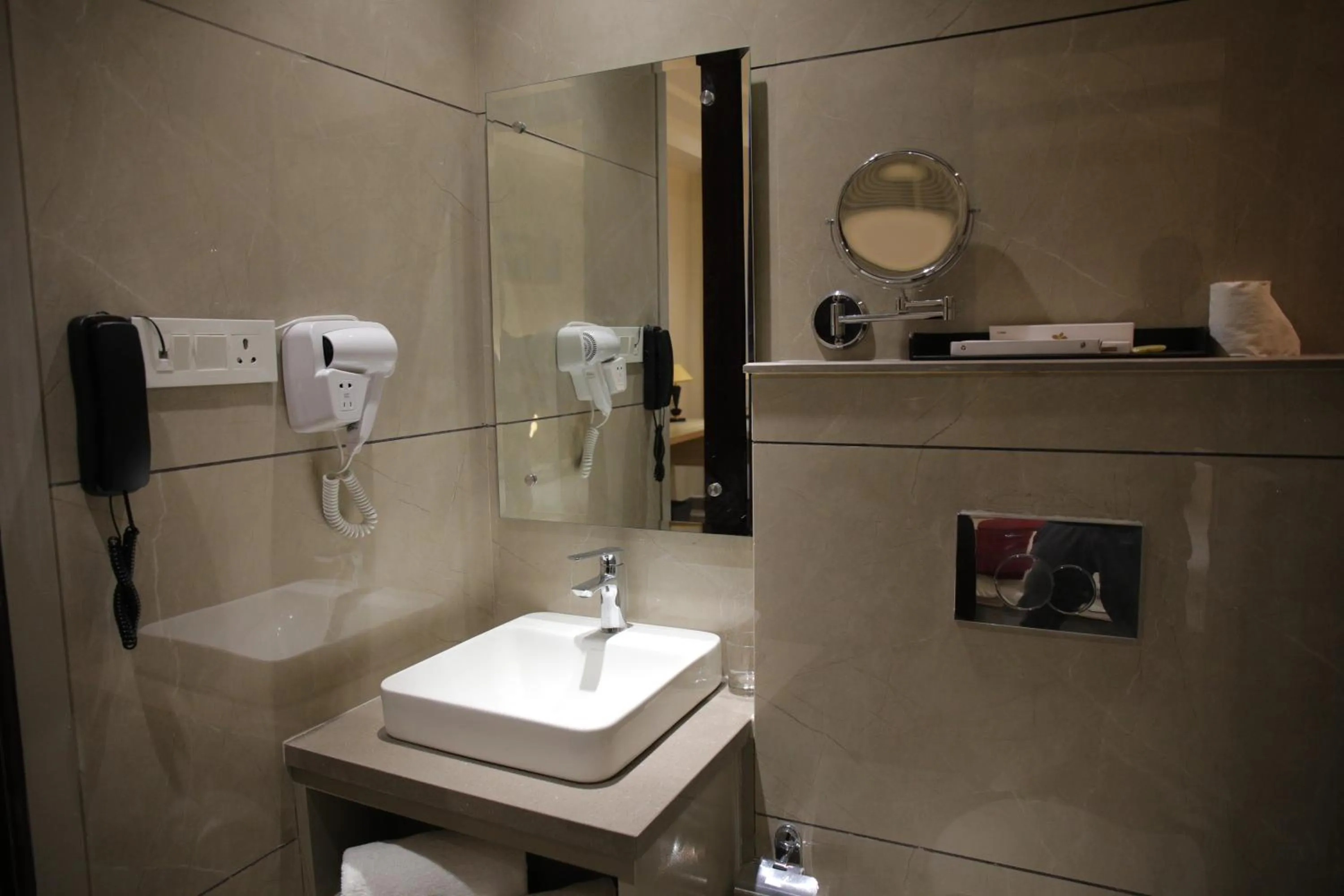 Bathroom in Pride Biznotel Haldwani