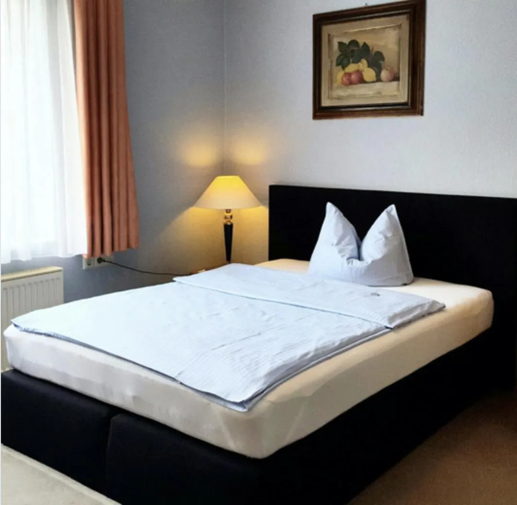 Bed in Occhipinti Passione - Restaurant & Hotel - Weyhausen