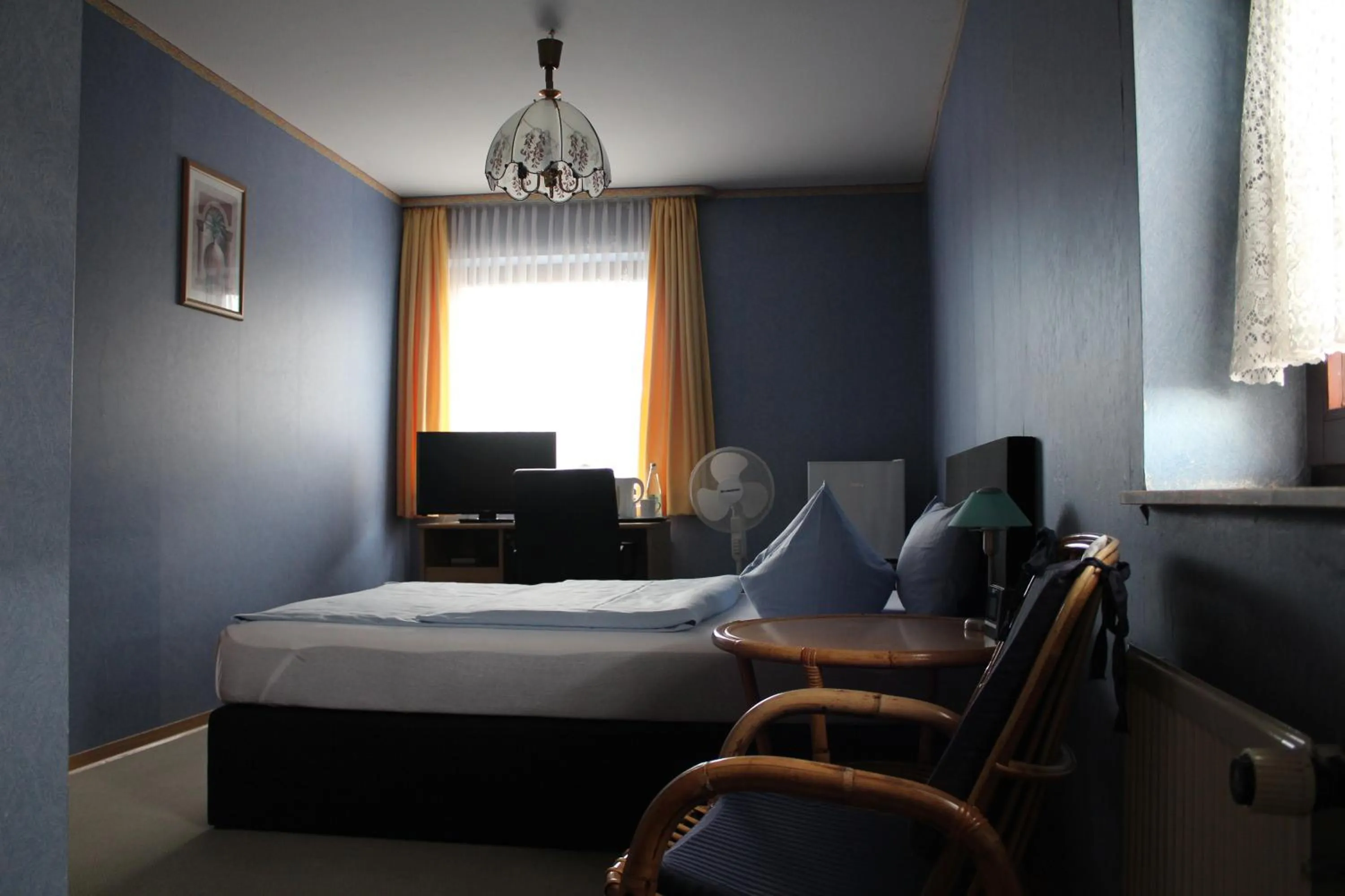 Photo of the whole room, Bed in Occhipinti Passione - Restaurant & Hotel - Weyhausen