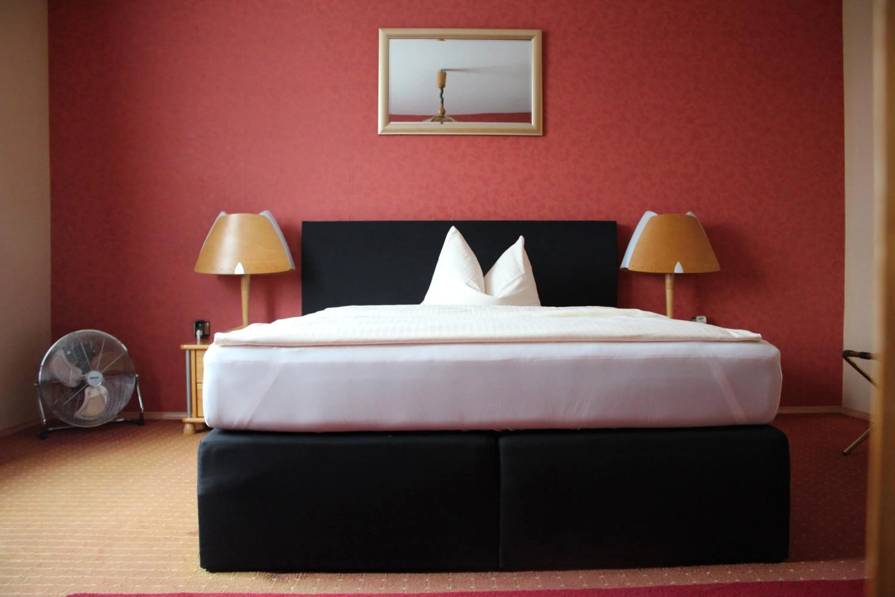 Bed in Occhipinti Passione - Restaurant & Hotel - Weyhausen