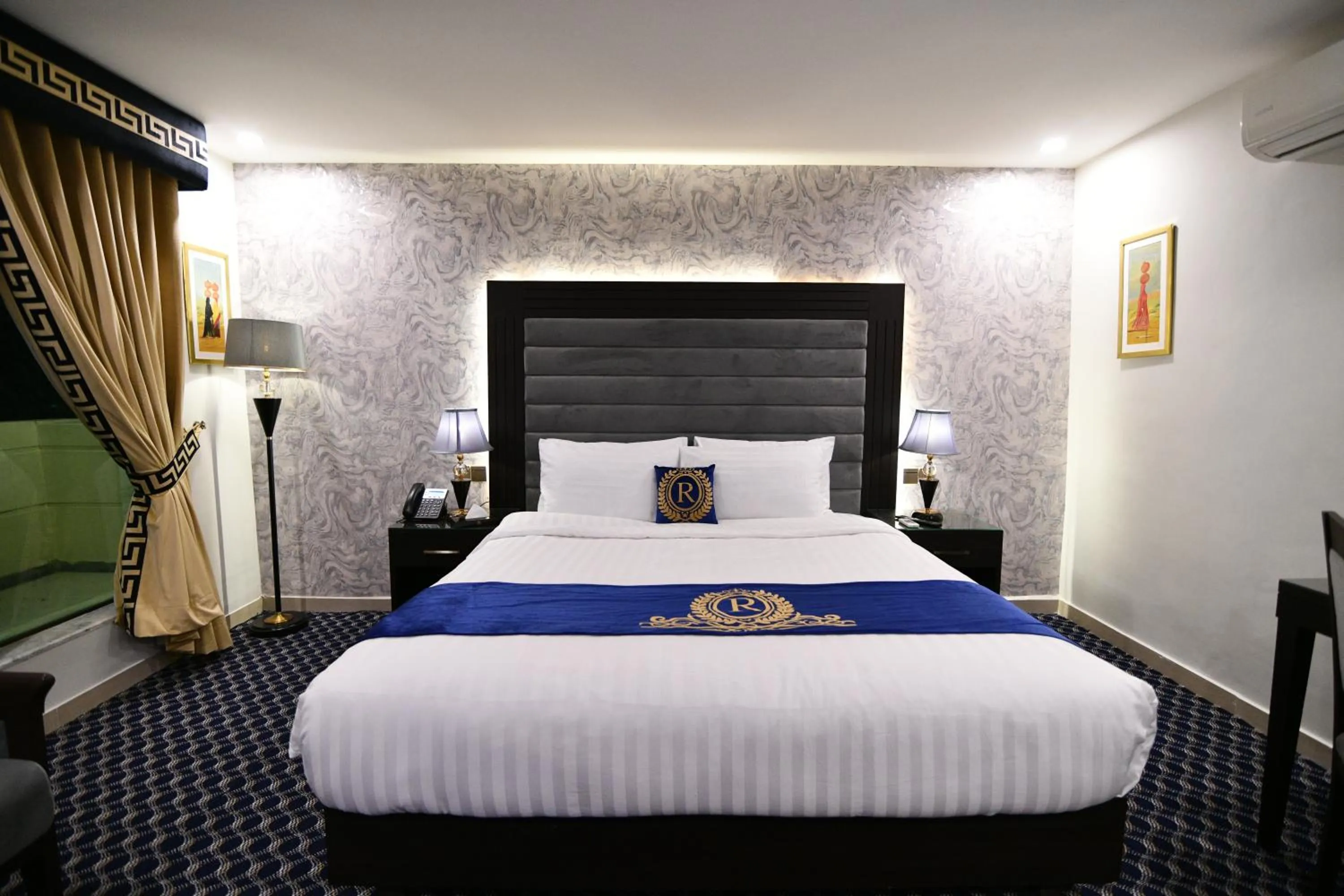 Bed in Royal Regency Hotel