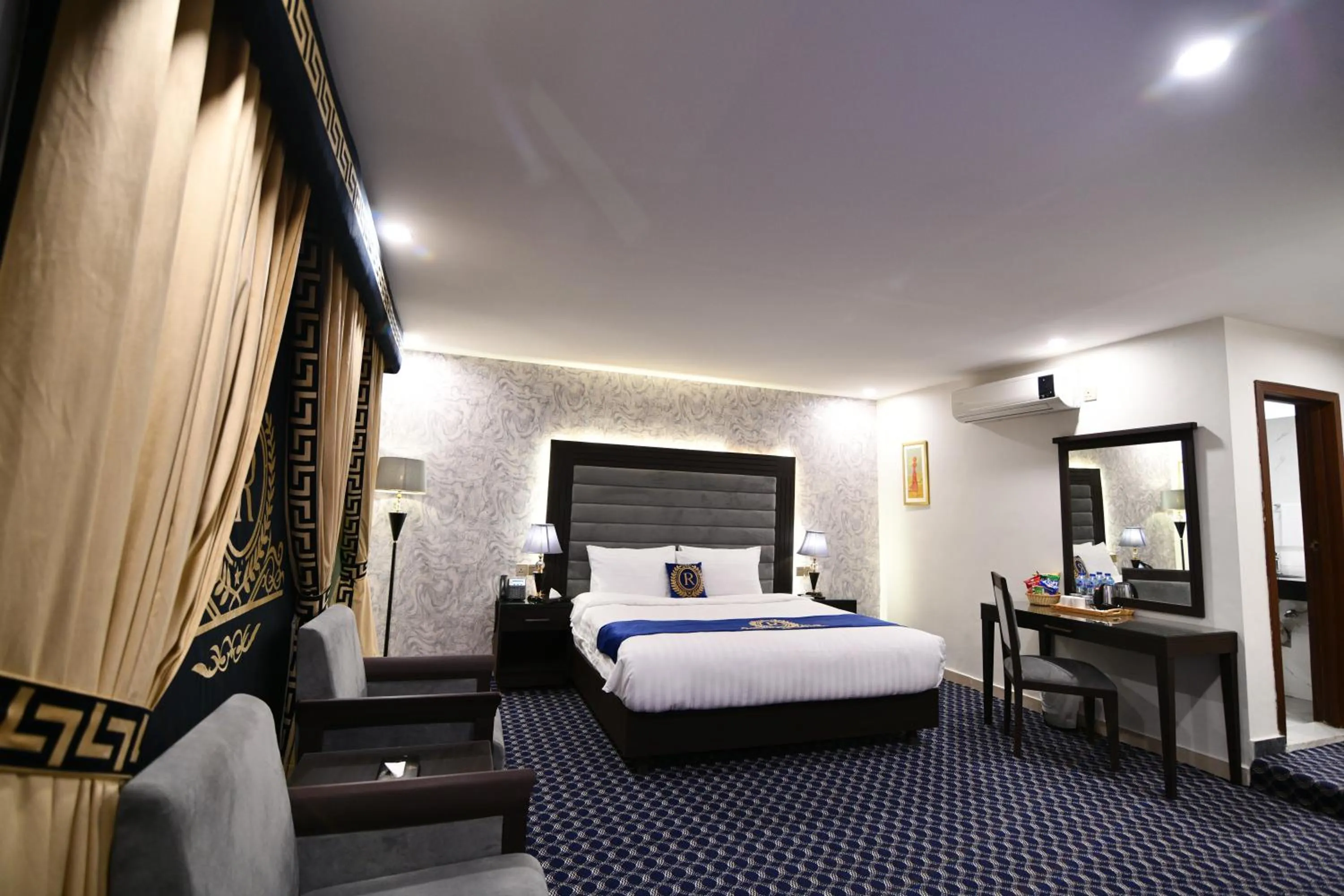 Bed in Royal Regency Hotel