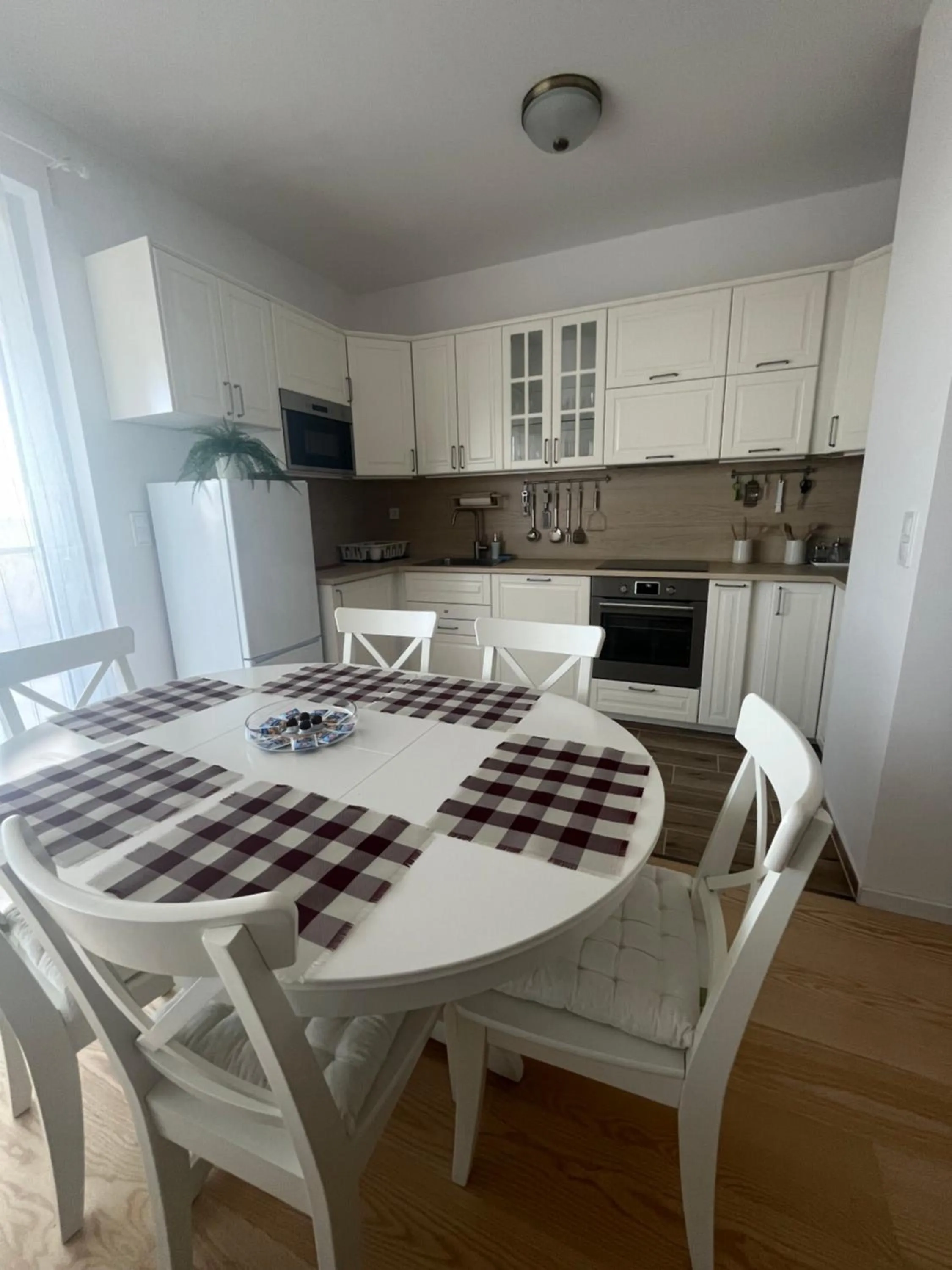 Kitchen or kitchenette in WaterFront City Apartments by FirstHost