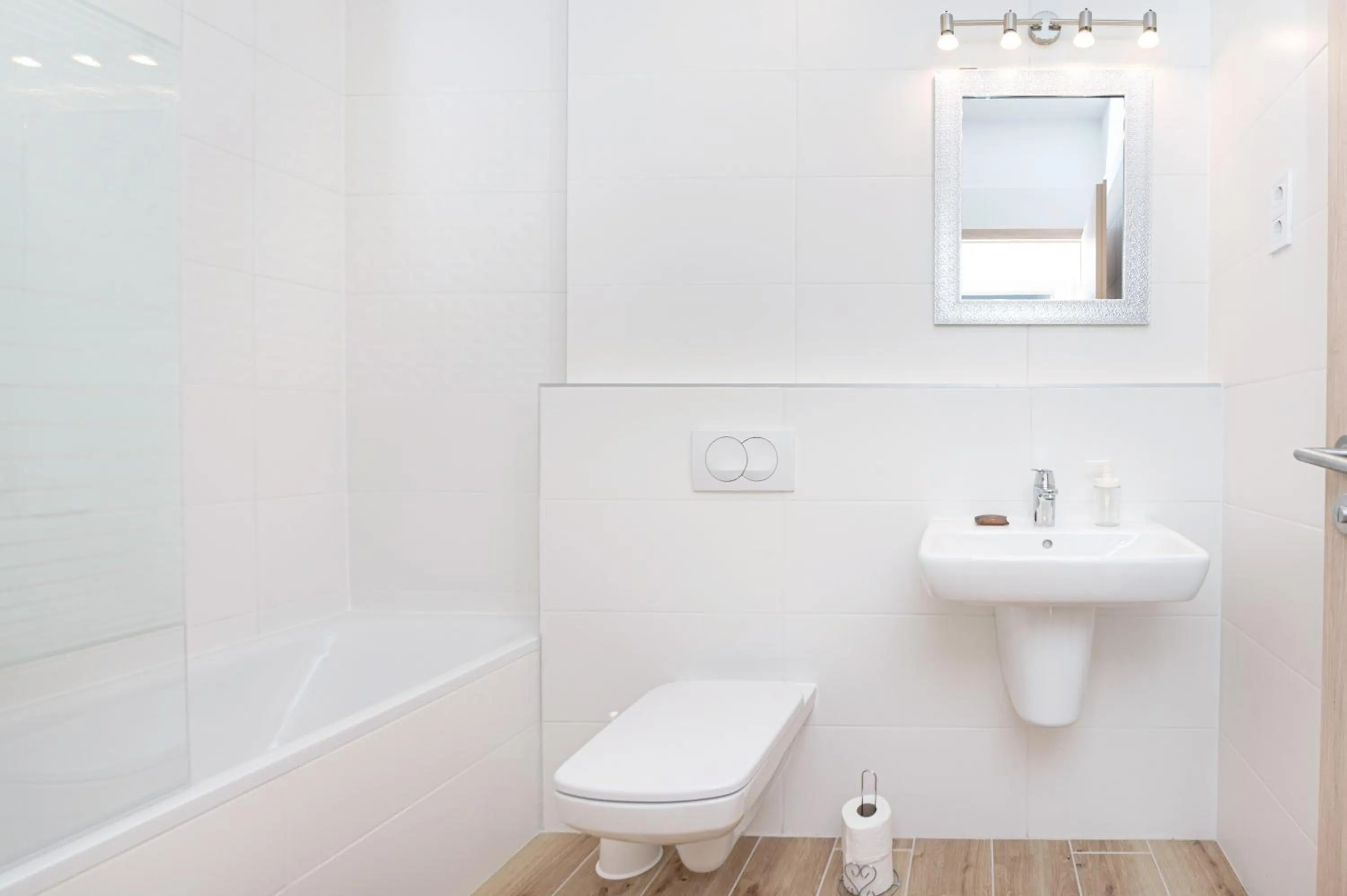 Shower in WaterFront City Apartments by FirstHost