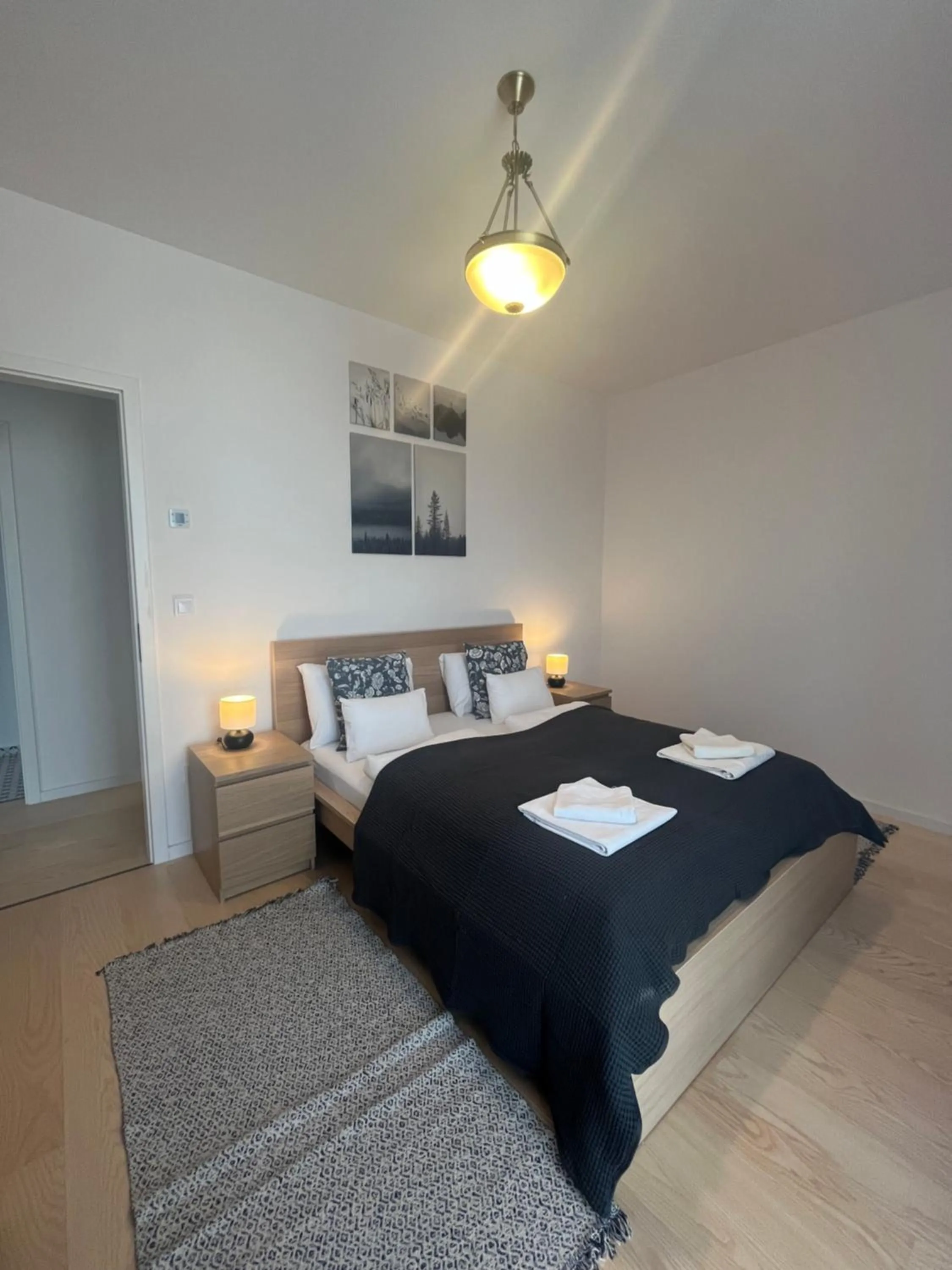 Bed in WaterFront City Apartments by FirstHost