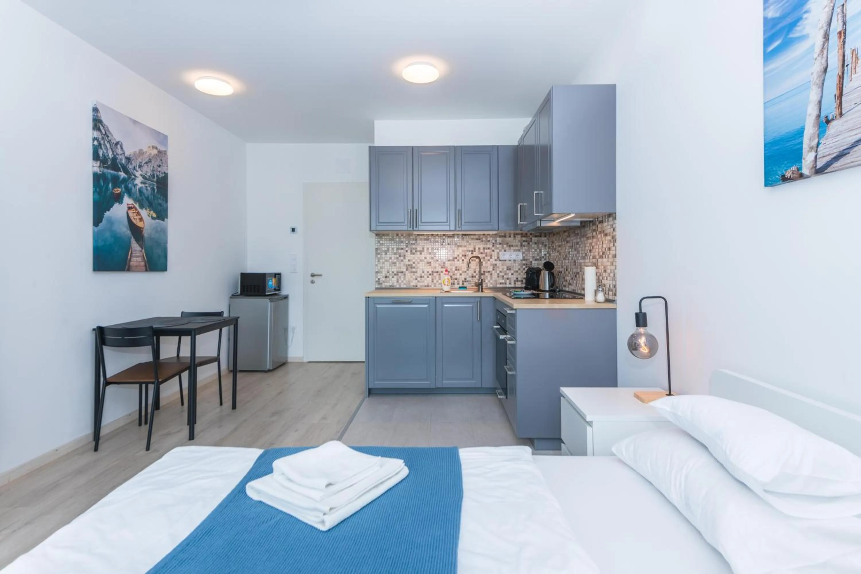 Bed in WaterFront City Apartments by FirstHost